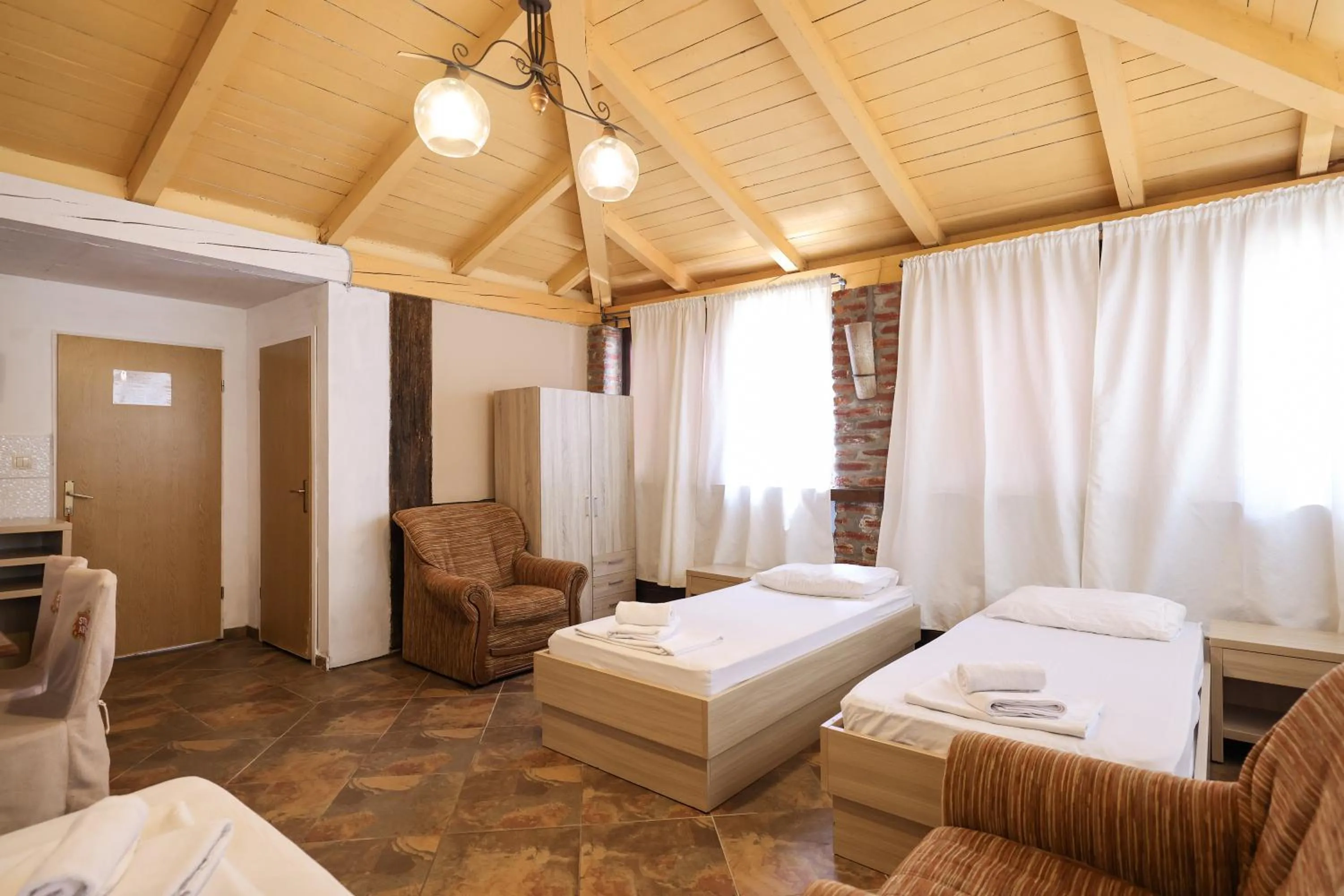 Bed in Tribunia Beach Hotel