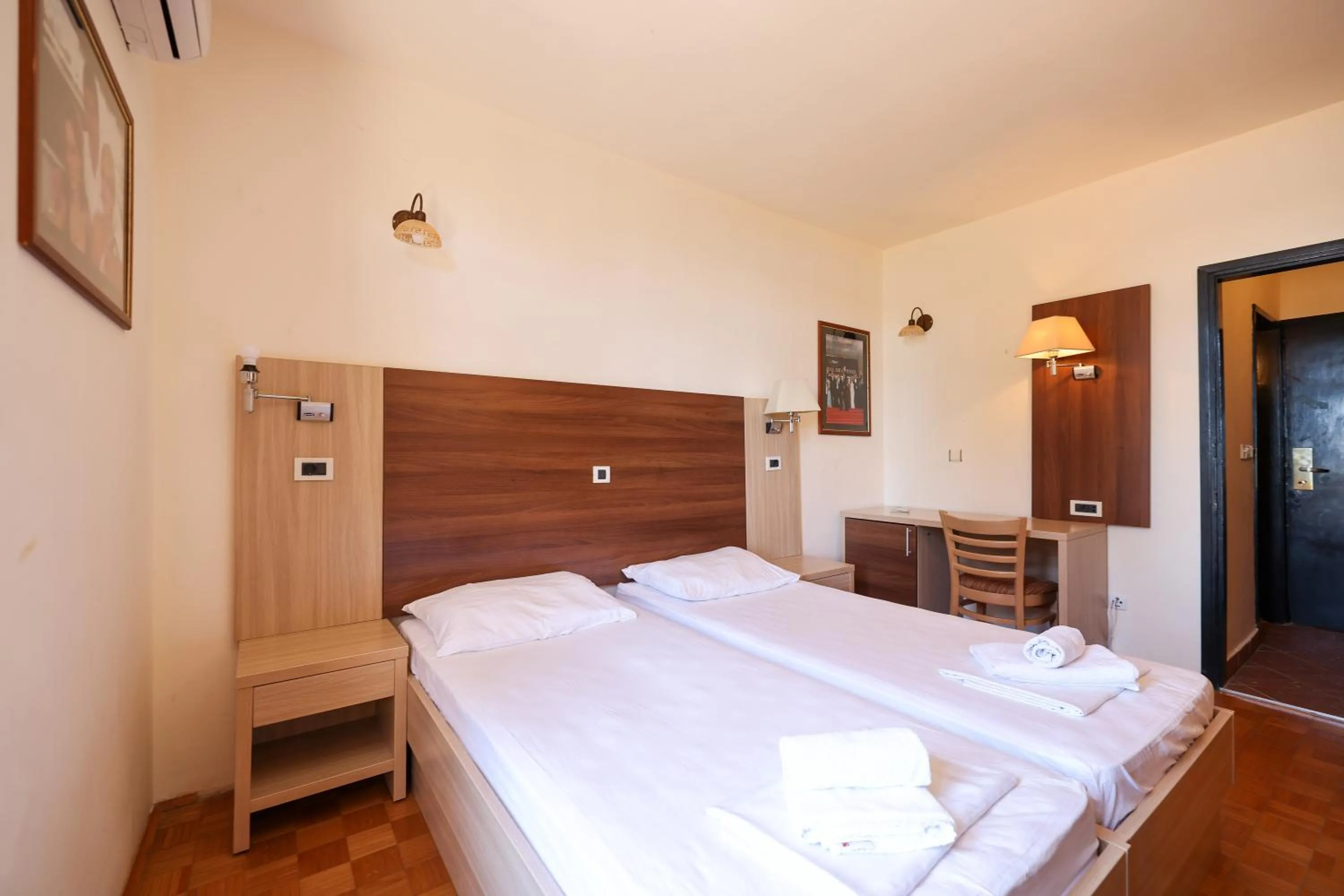 Bed in Tribunia Beach Hotel