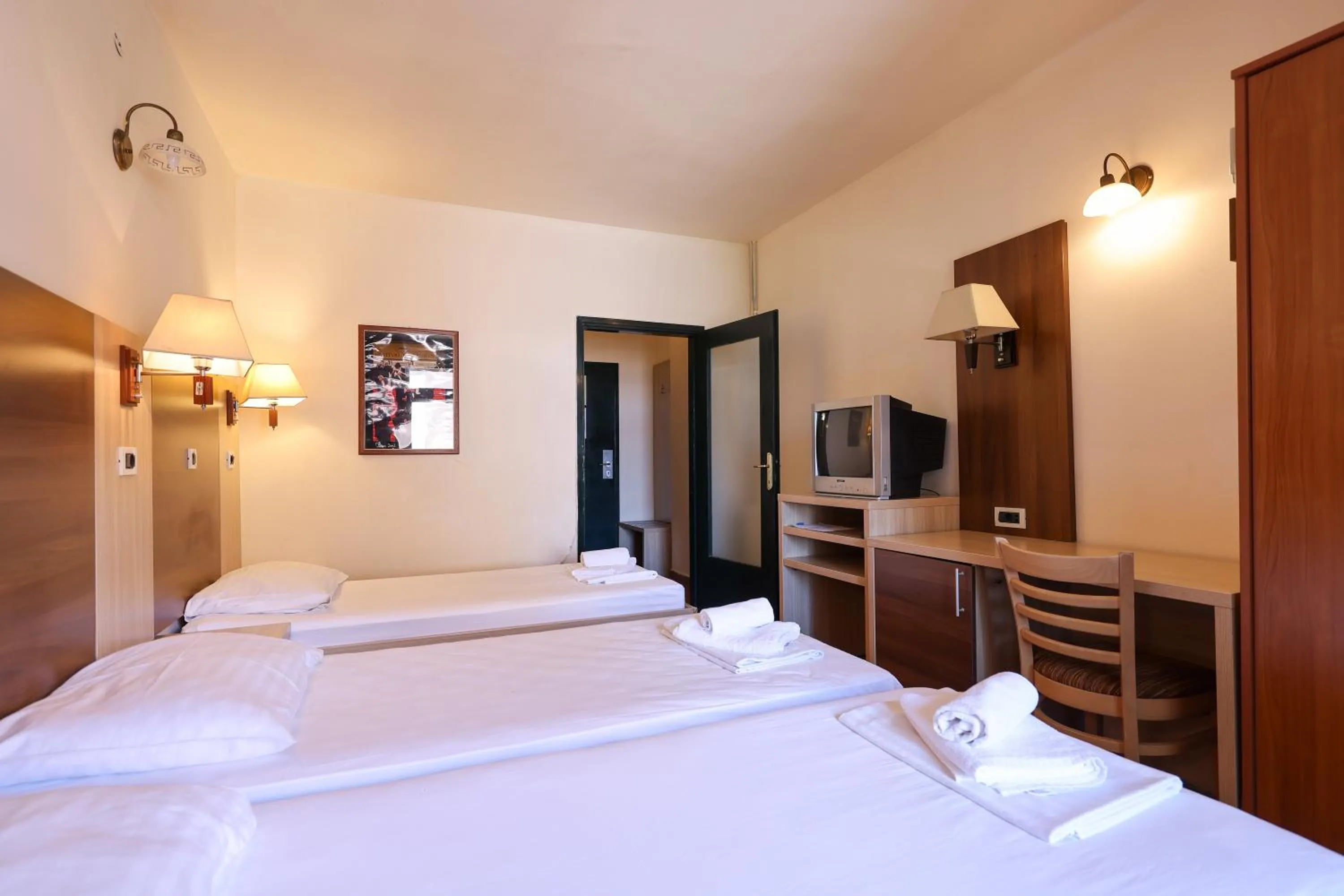 Bed in Tribunia Beach Hotel