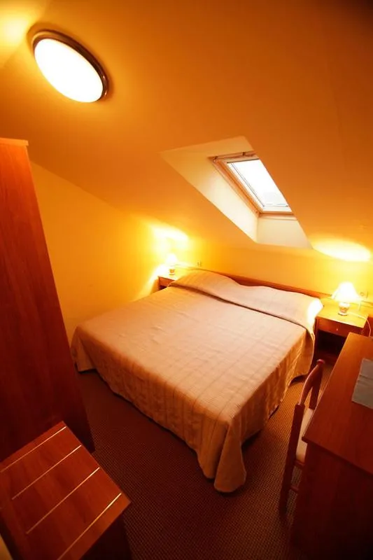 Bed in Tribunia Beach Hotel