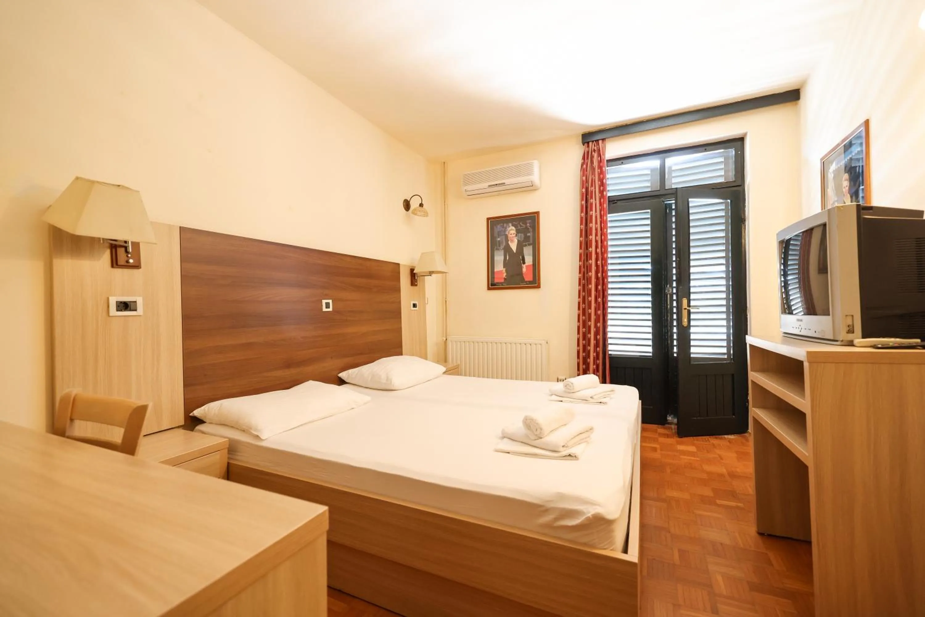 Bed in Tribunia Beach Hotel