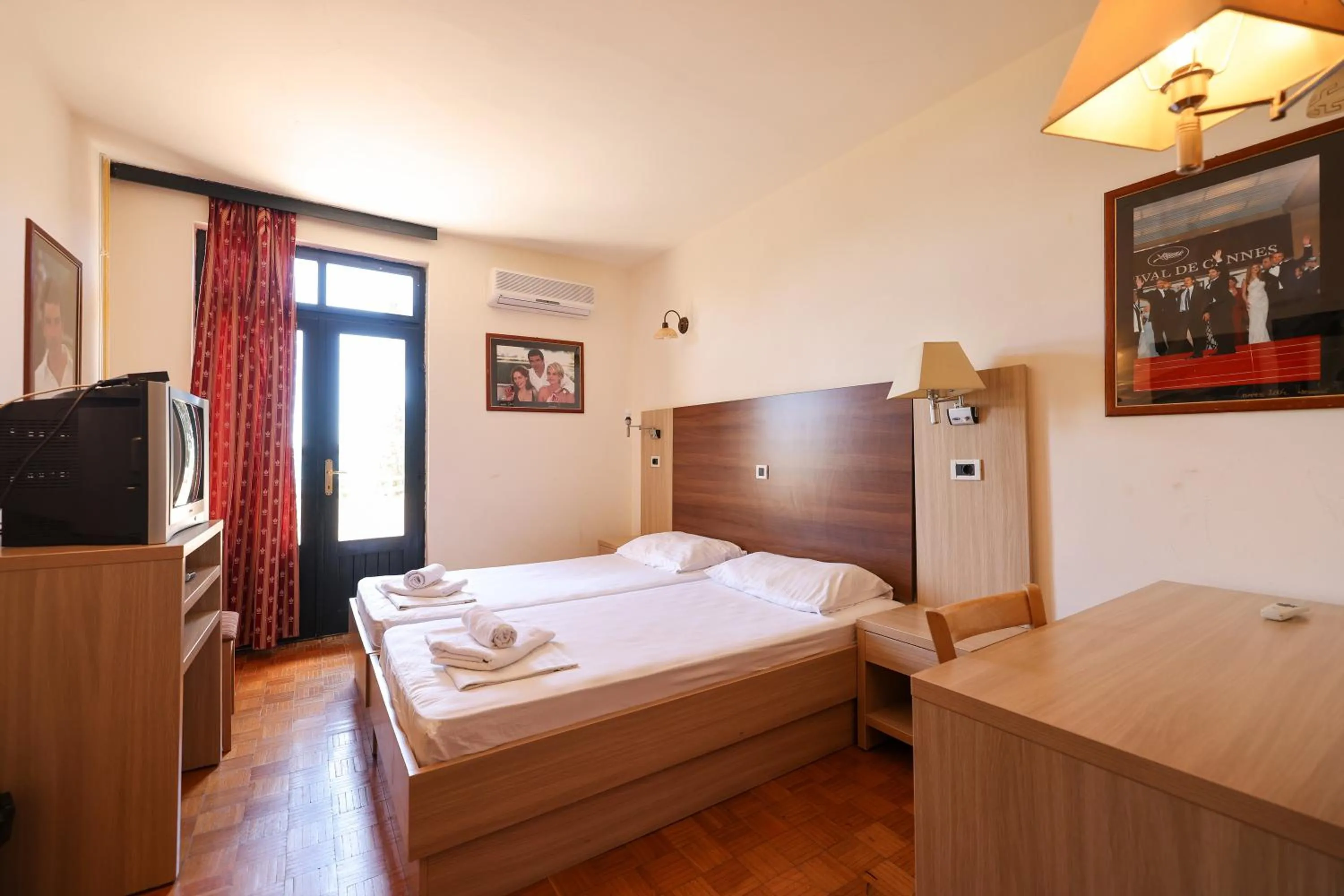 Bed in Tribunia Beach Hotel