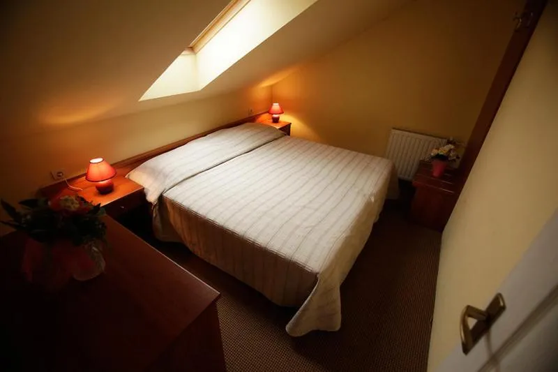 Bed in Tribunia Beach Hotel