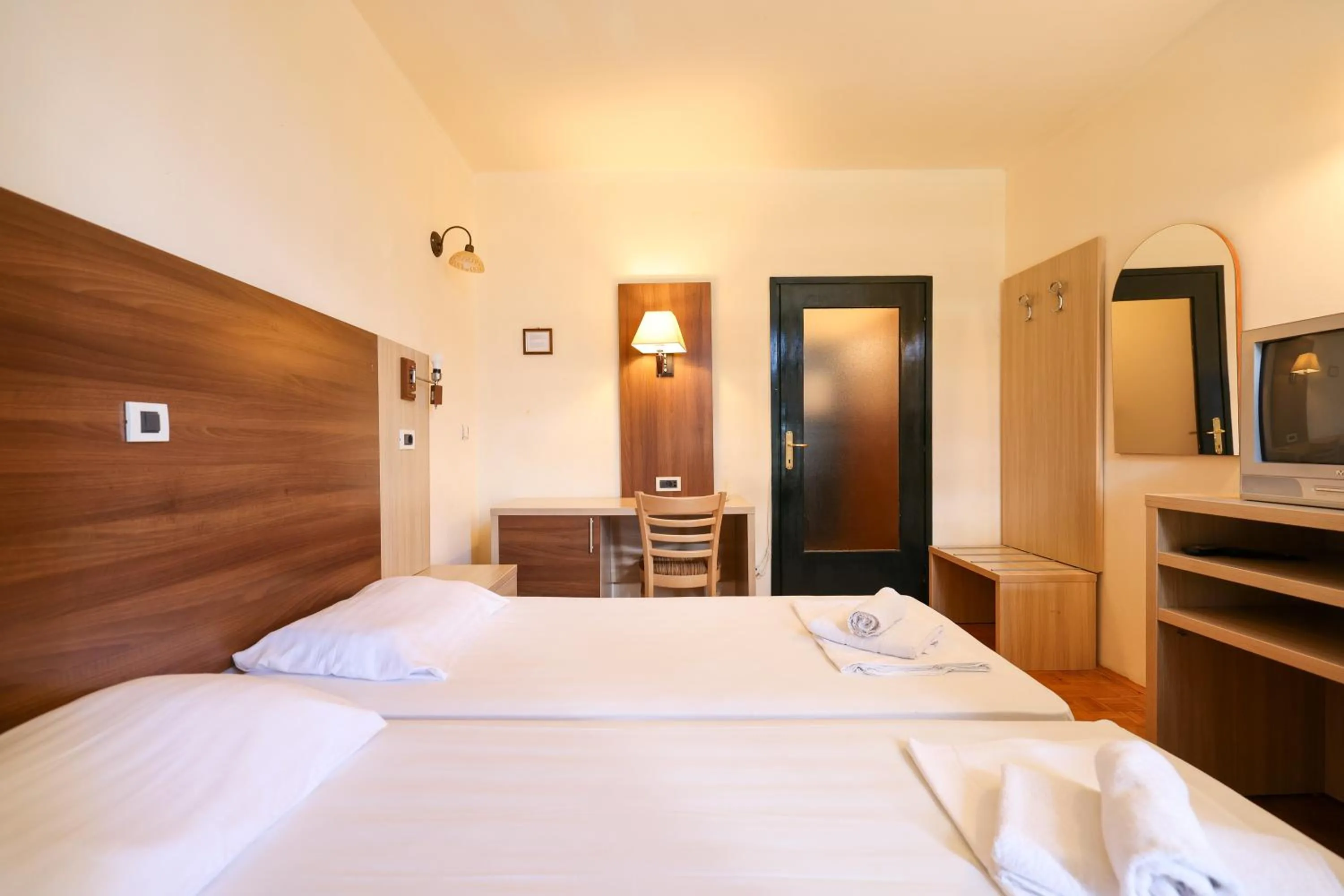 Bed in Tribunia Beach Hotel