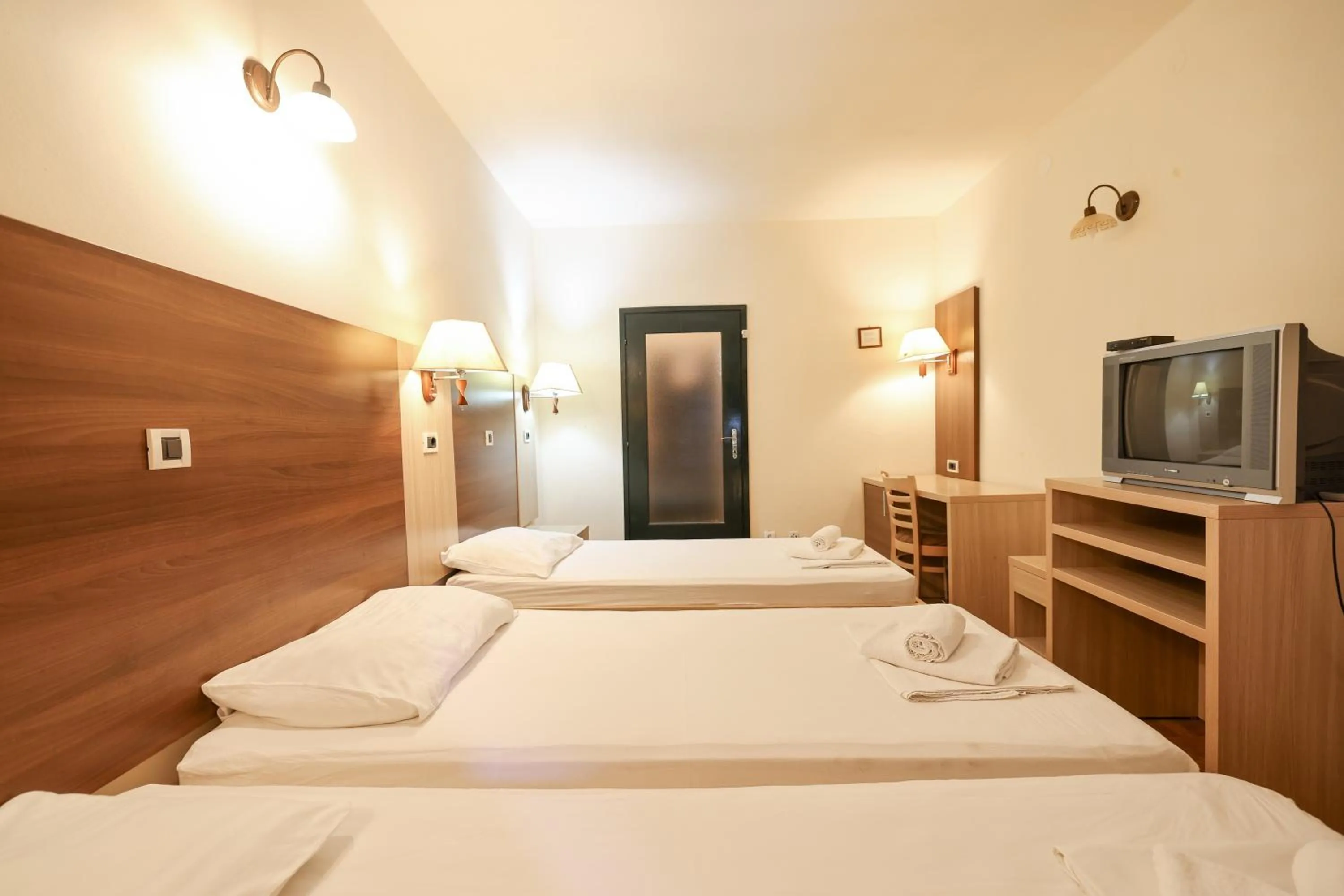 Bed in Tribunia Beach Hotel