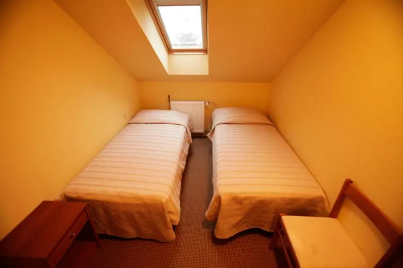 Bed in Tribunia Beach Hotel