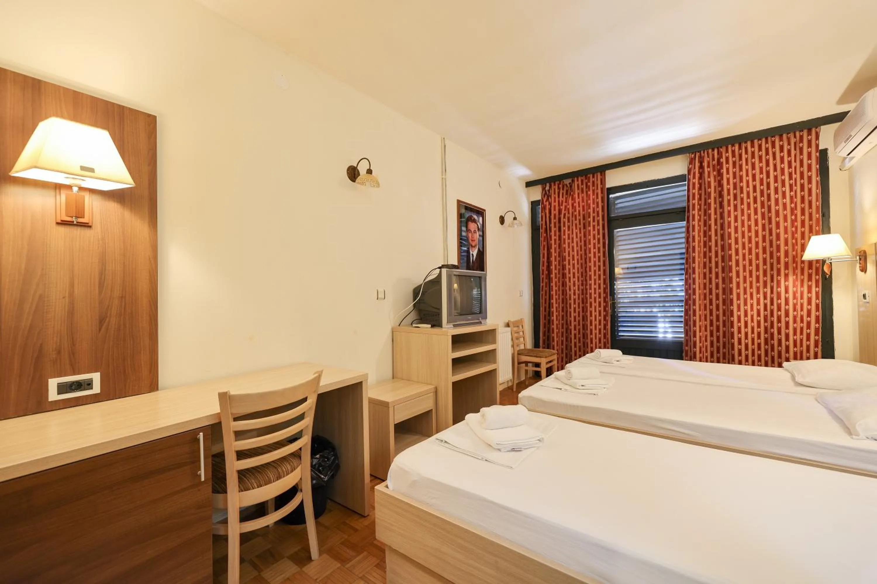 Bed in Tribunia Beach Hotel