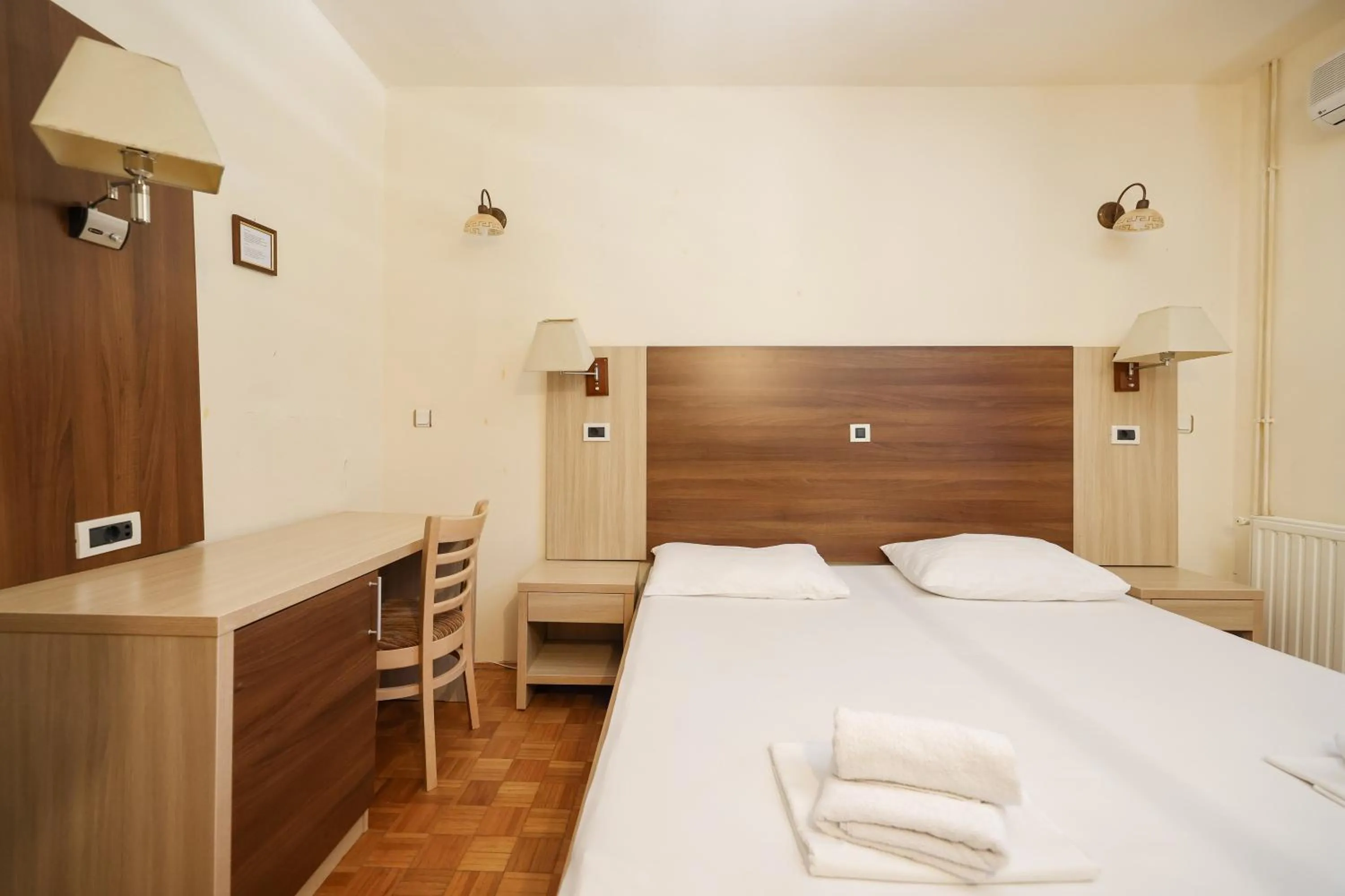 Bed in Tribunia Beach Hotel