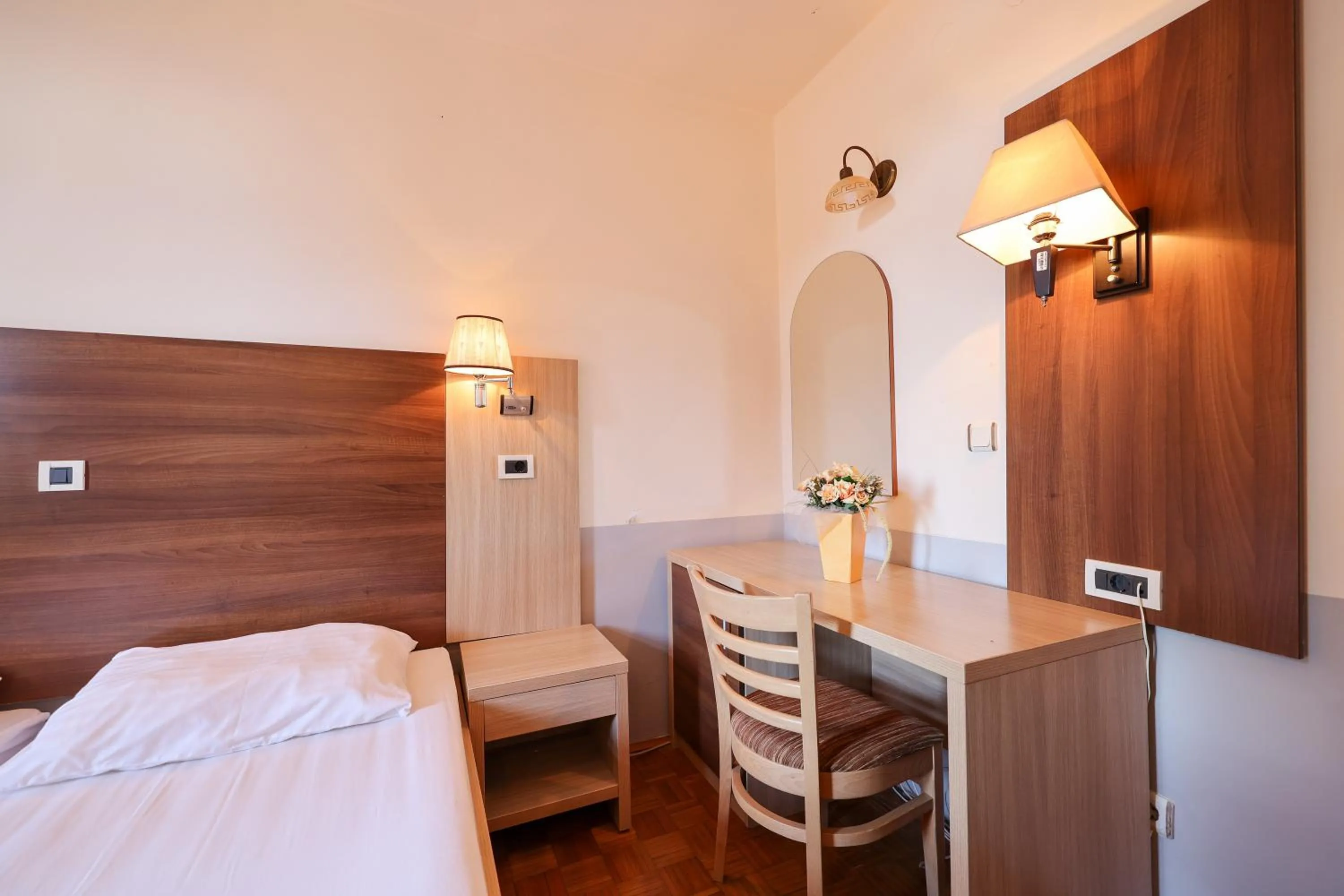 Bed in Tribunia Beach Hotel