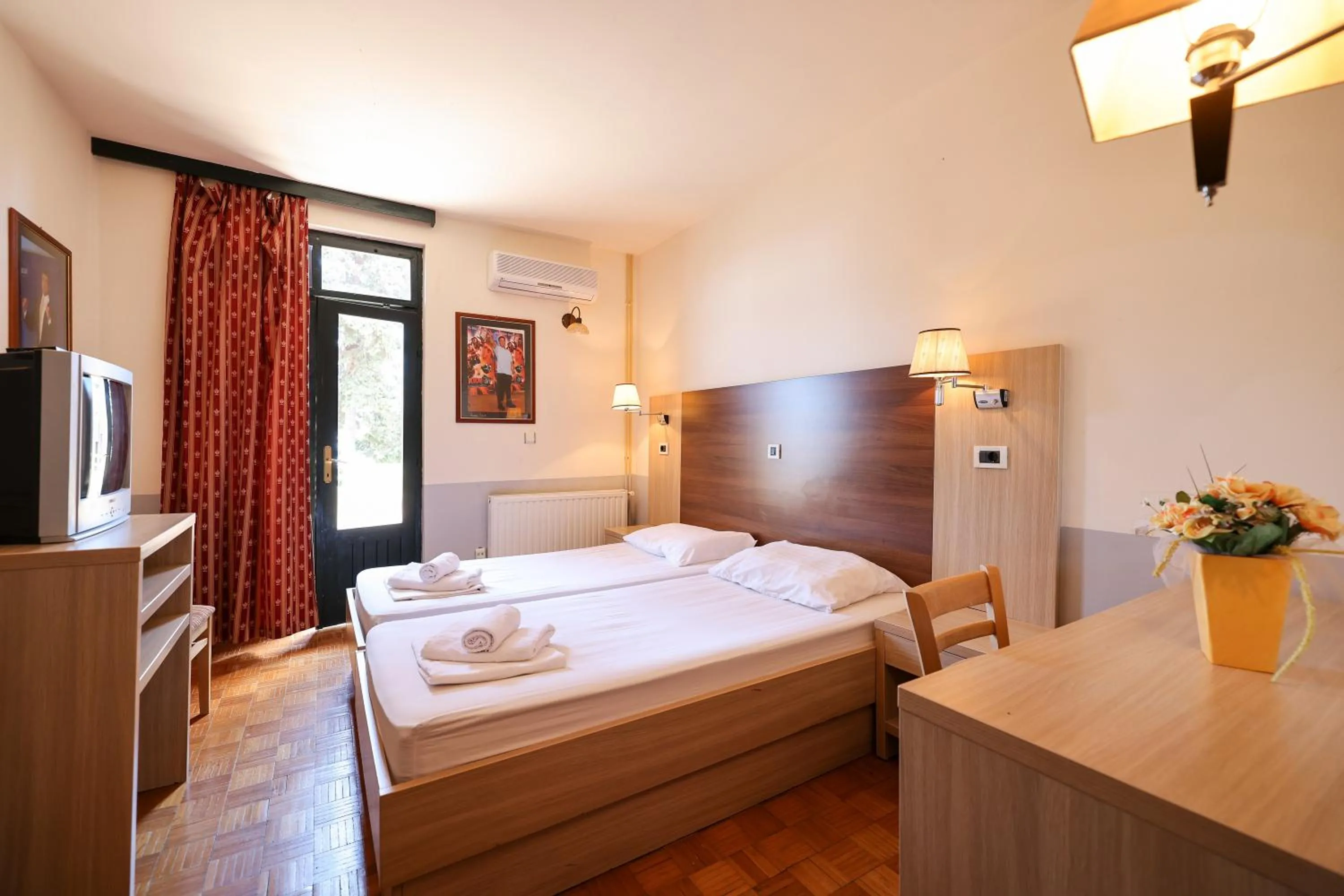 Bed in Tribunia Beach Hotel