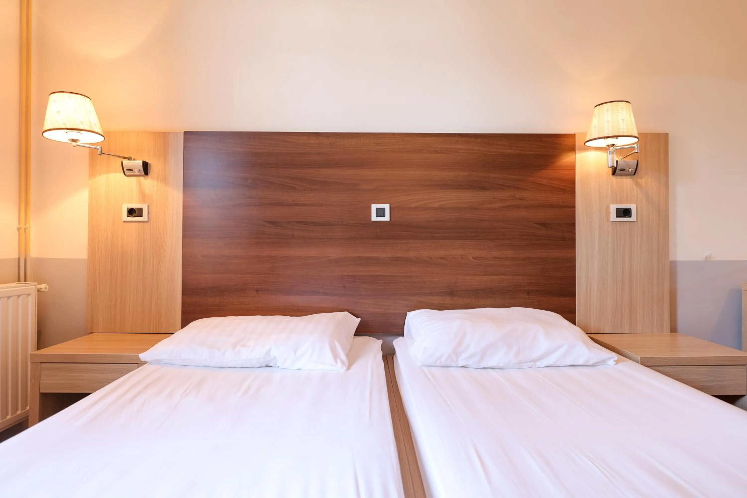 Bed in Tribunia Beach Hotel