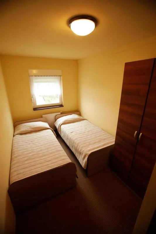 Bed in Tribunia Beach Hotel