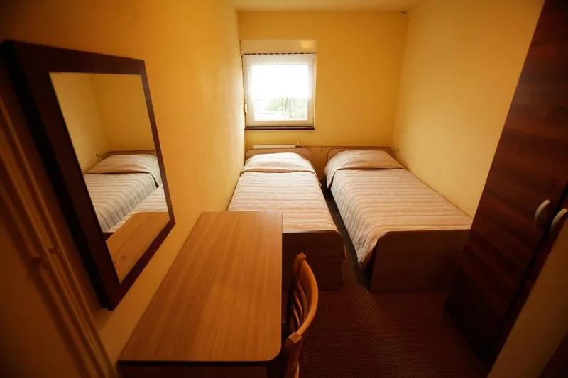 Bed in Tribunia Beach Hotel