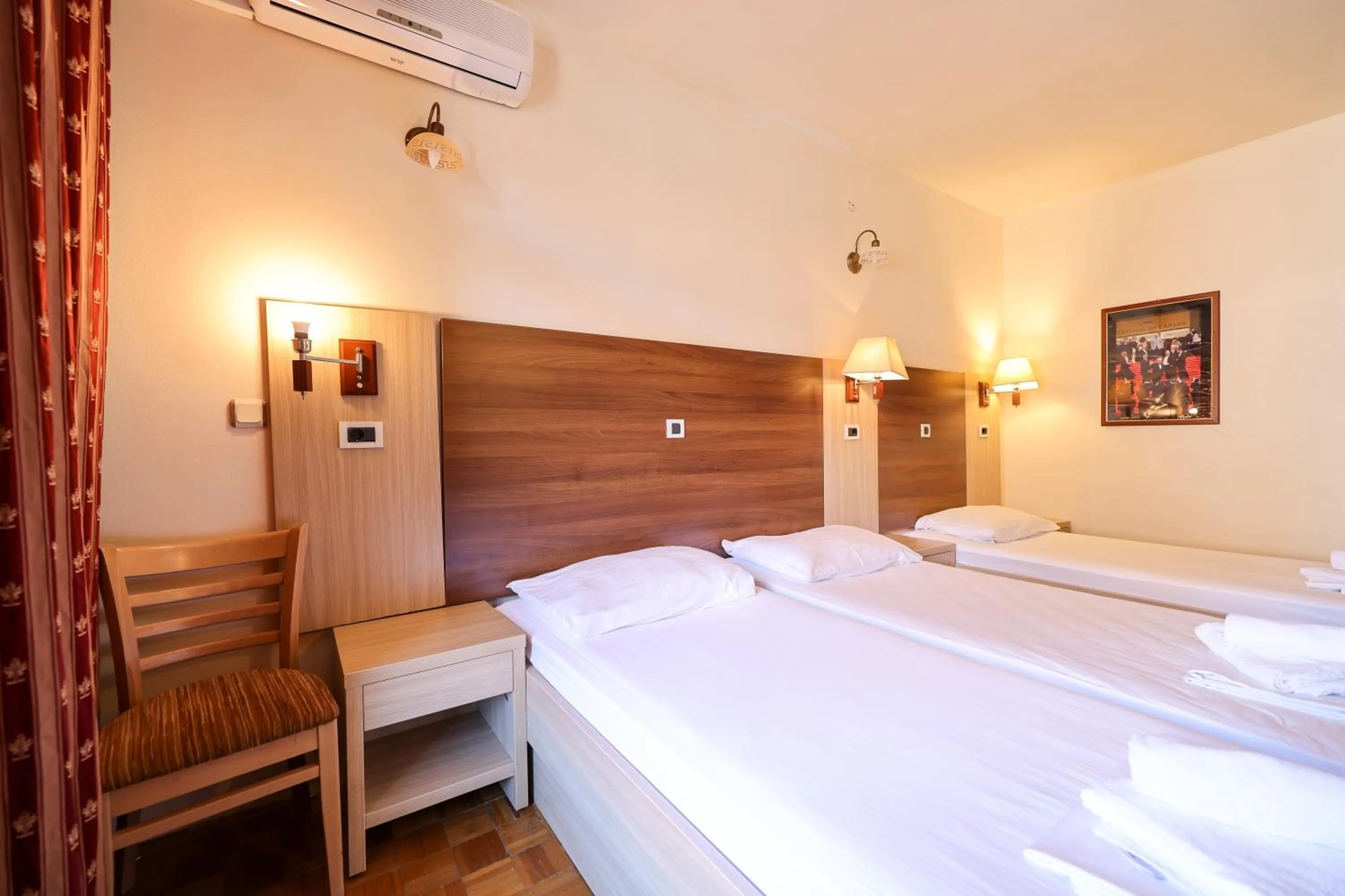 Bed in Tribunia Beach Hotel