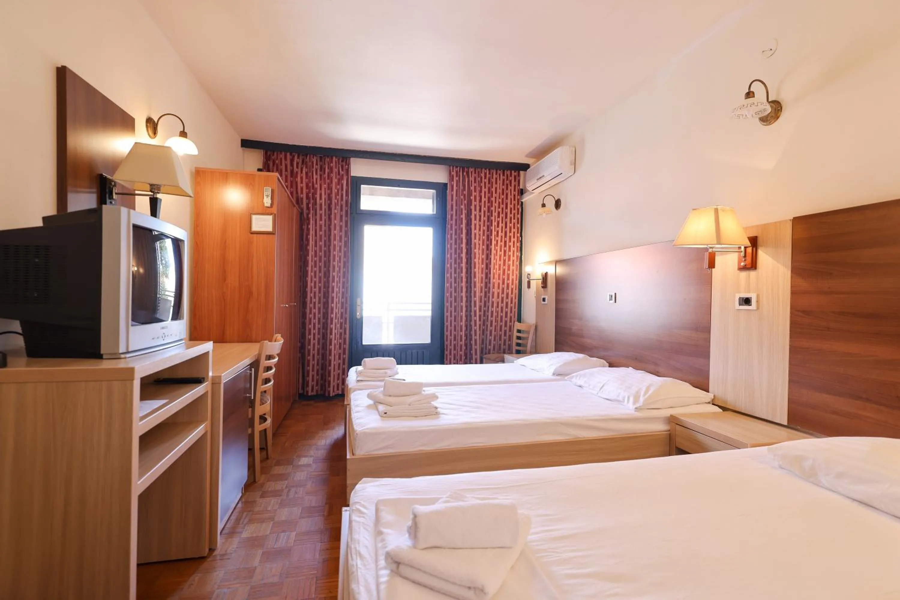 Bed in Tribunia Beach Hotel