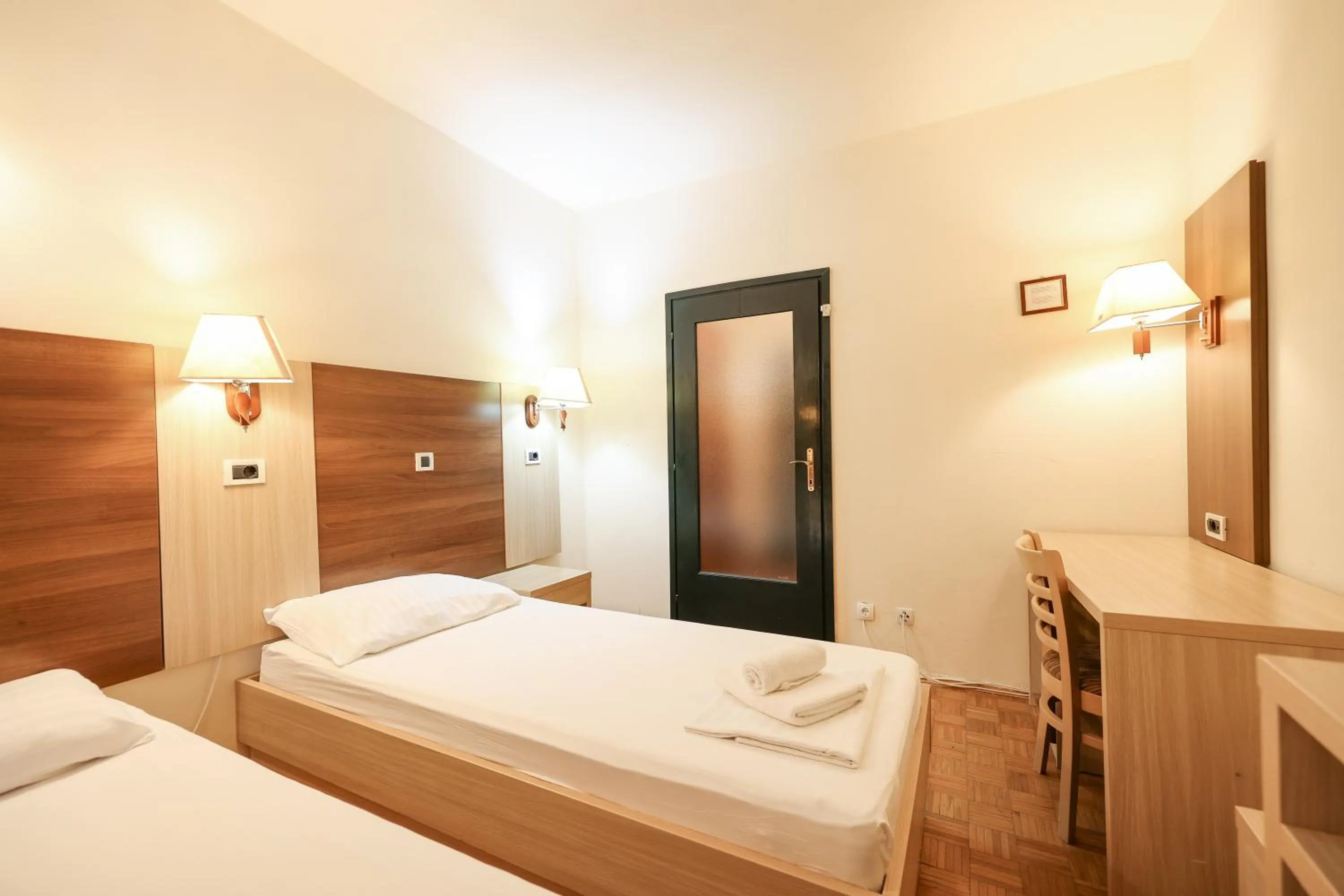 Bed in Tribunia Beach Hotel