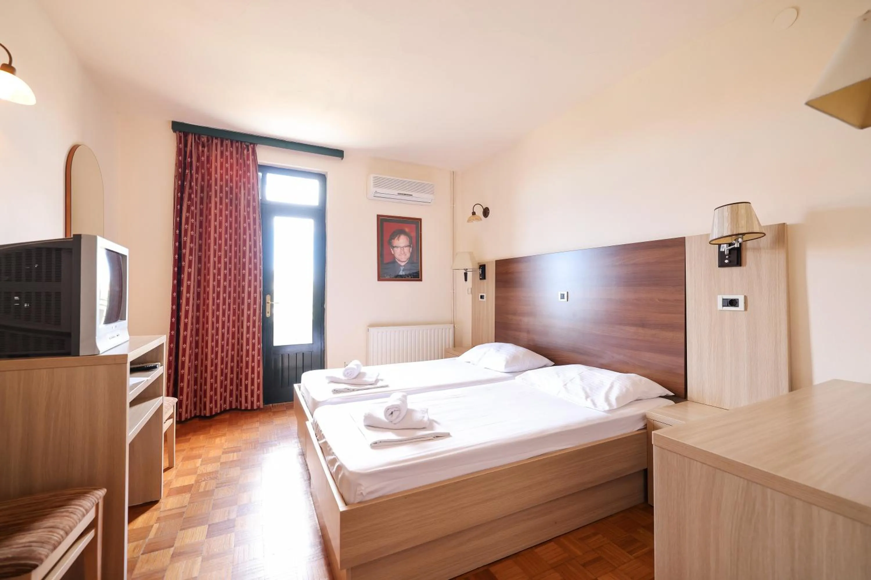 Bed in Tribunia Beach Hotel