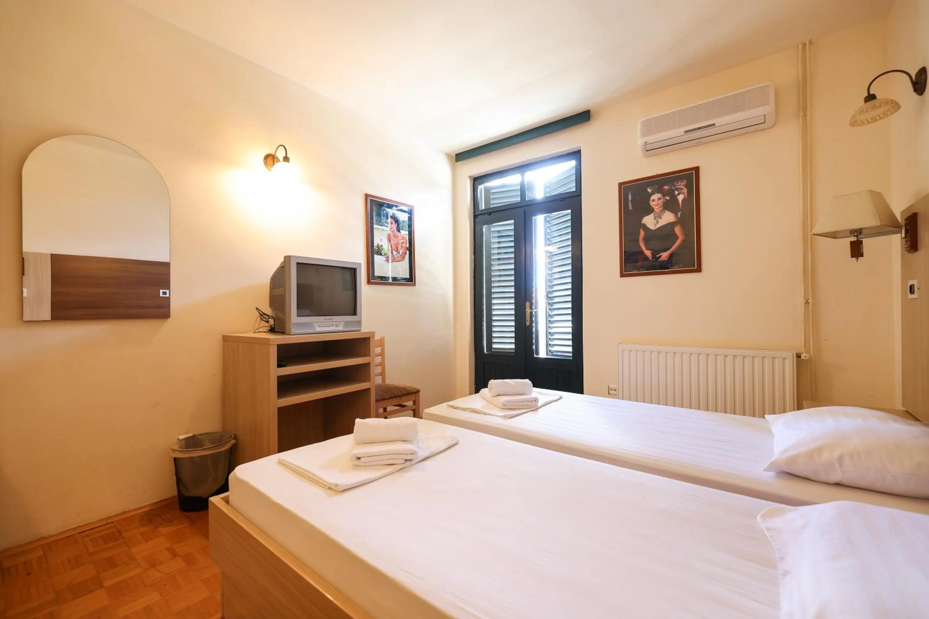 Bed in Tribunia Beach Hotel