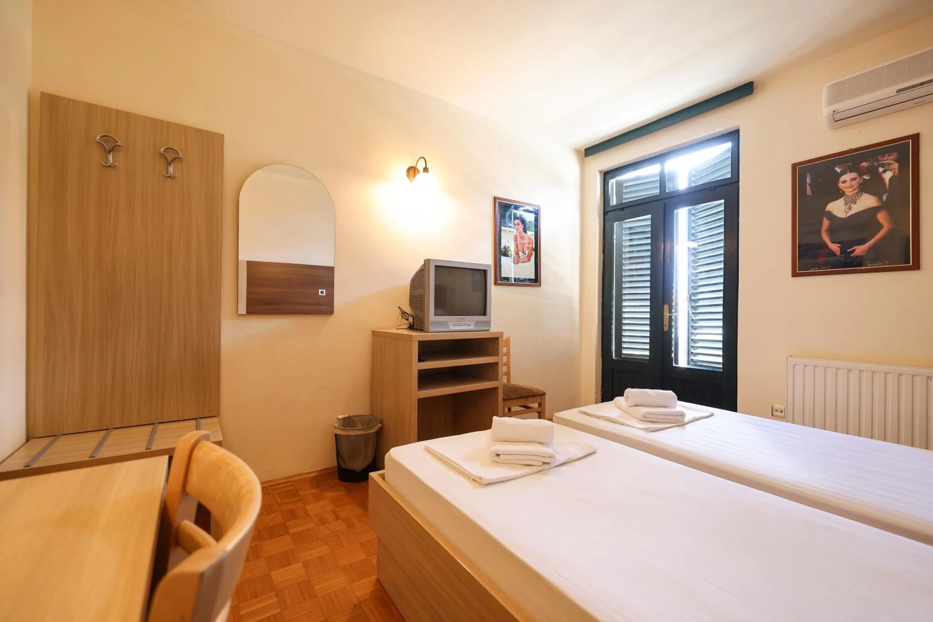 Bed in Tribunia Beach Hotel
