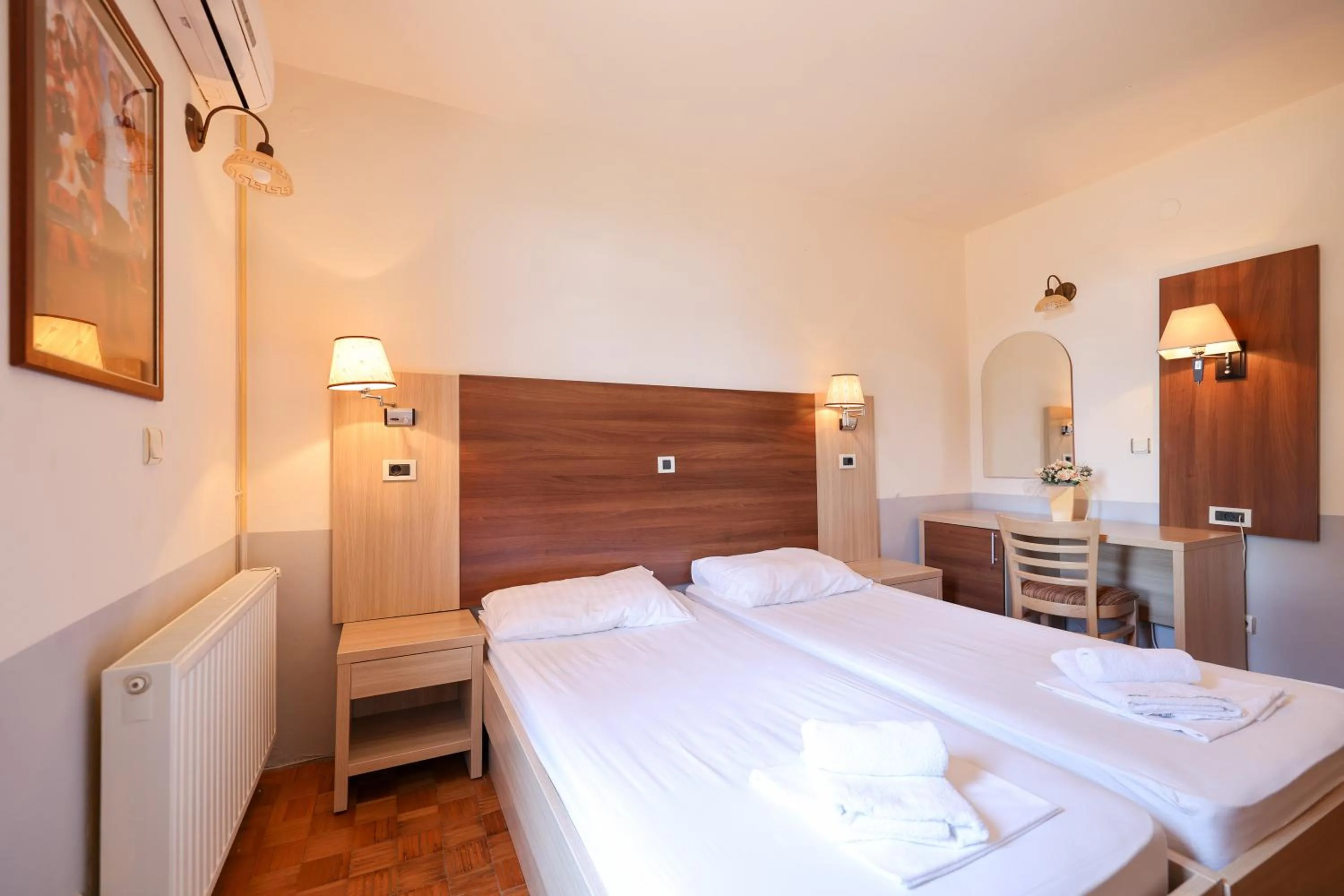 Bed in Tribunia Beach Hotel