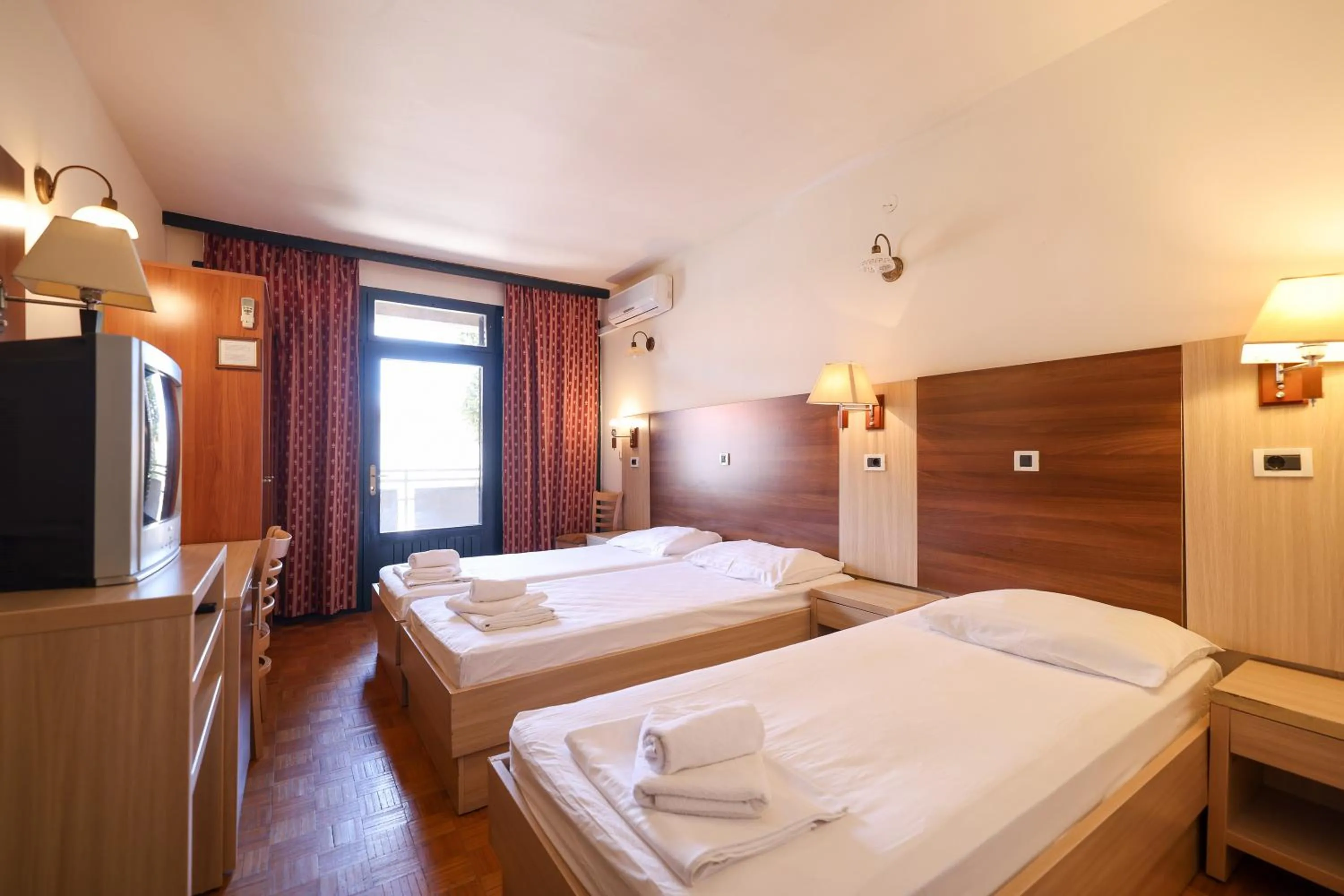 Bed in Tribunia Beach Hotel