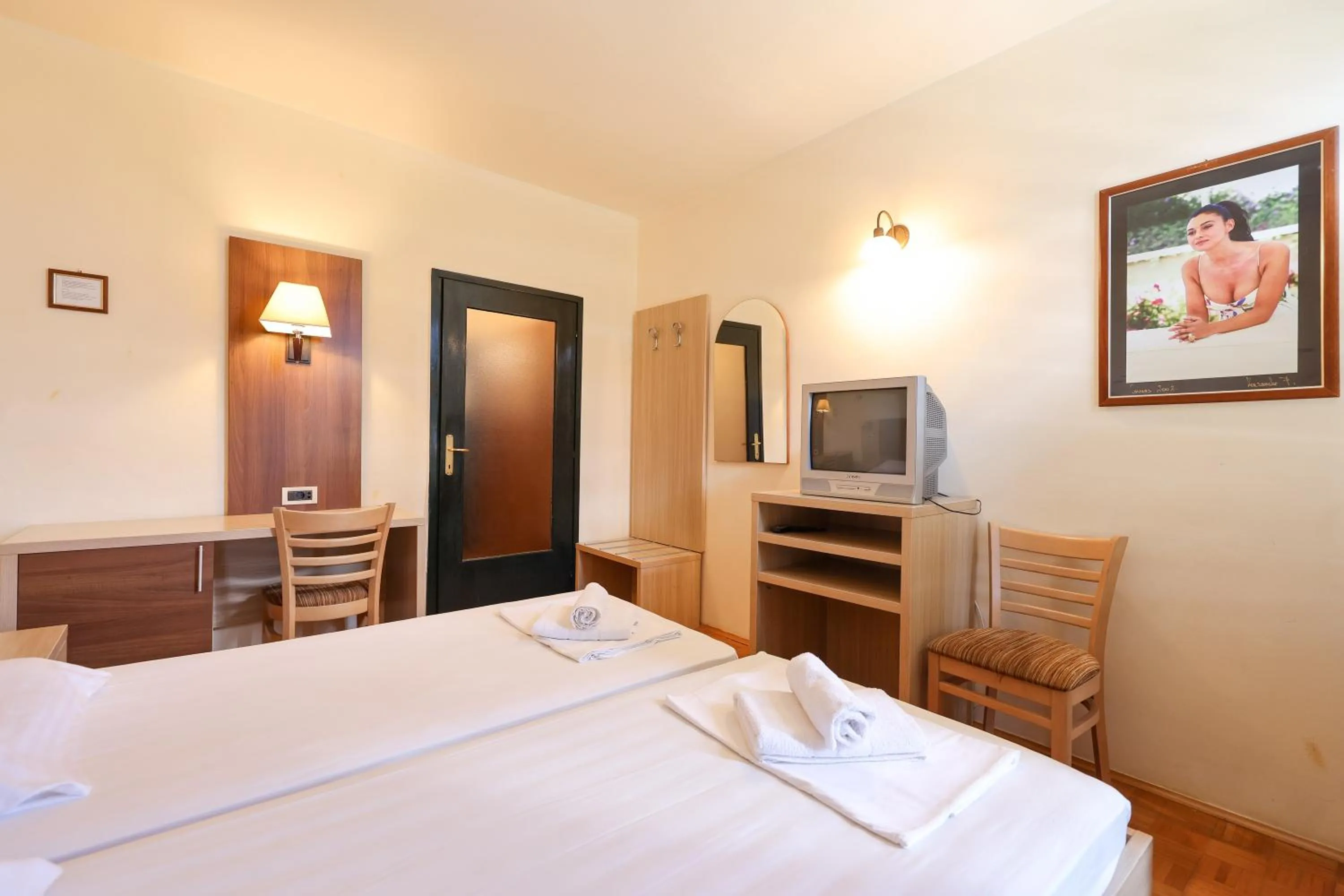 Bed in Tribunia Beach Hotel