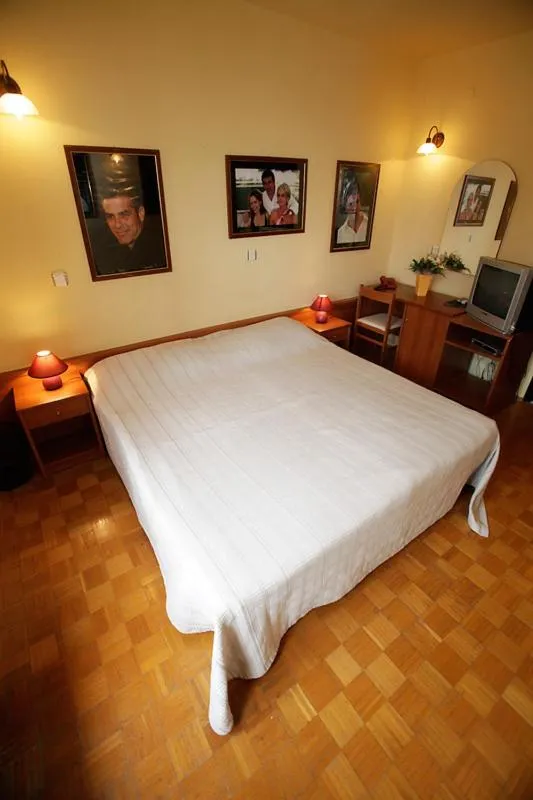 Bed in Tribunia Beach Hotel