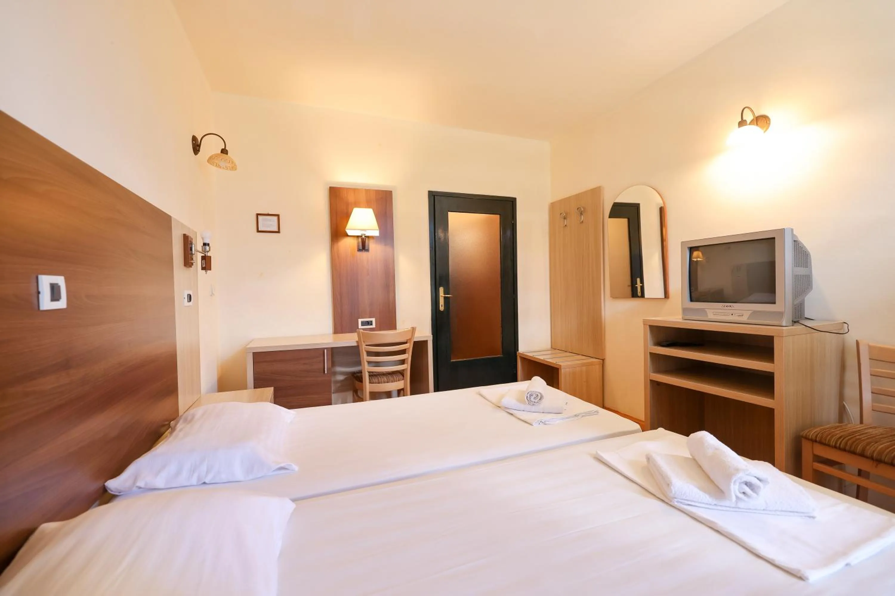 Bed in Tribunia Beach Hotel
