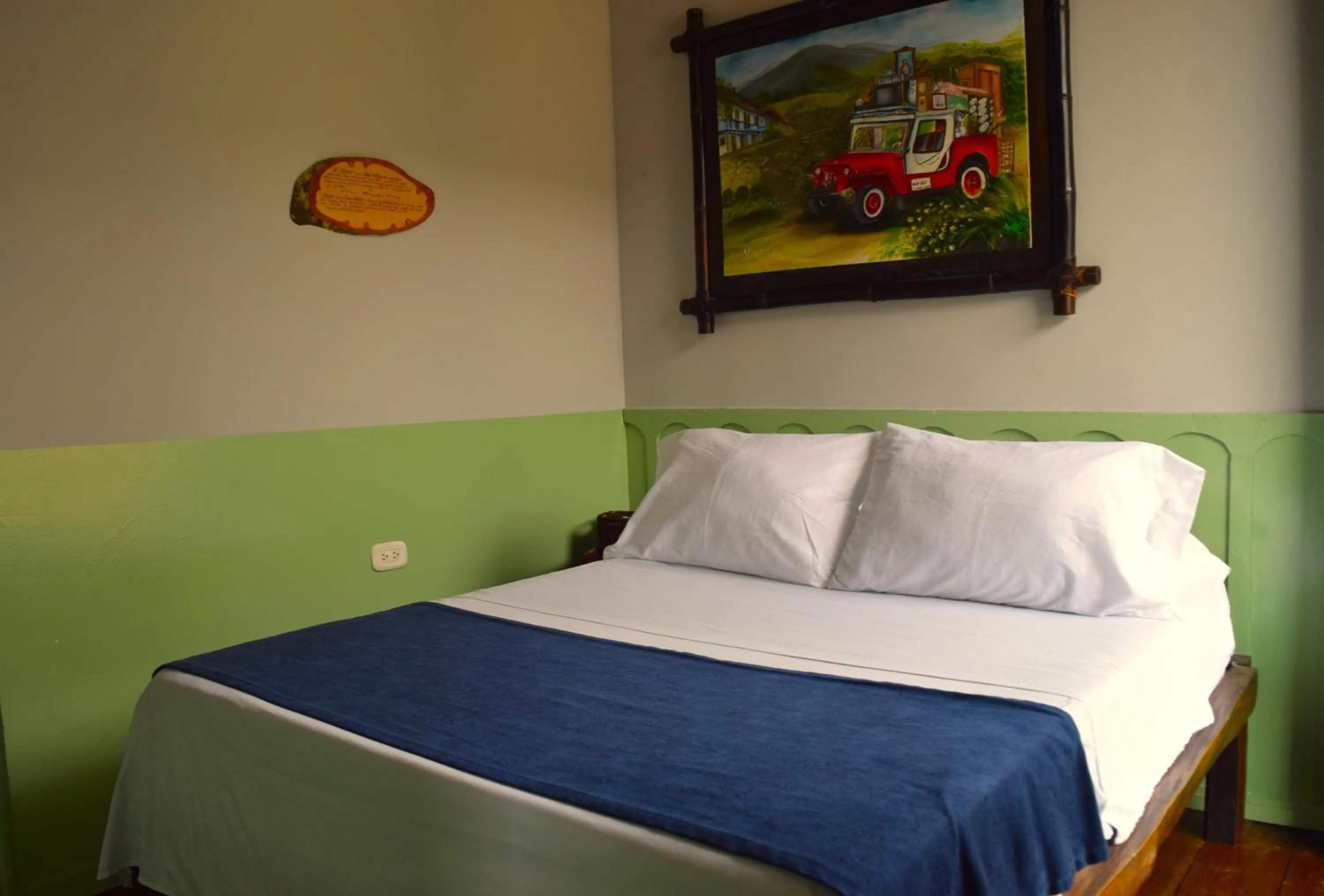 Bed in FILANDIA HOTEL