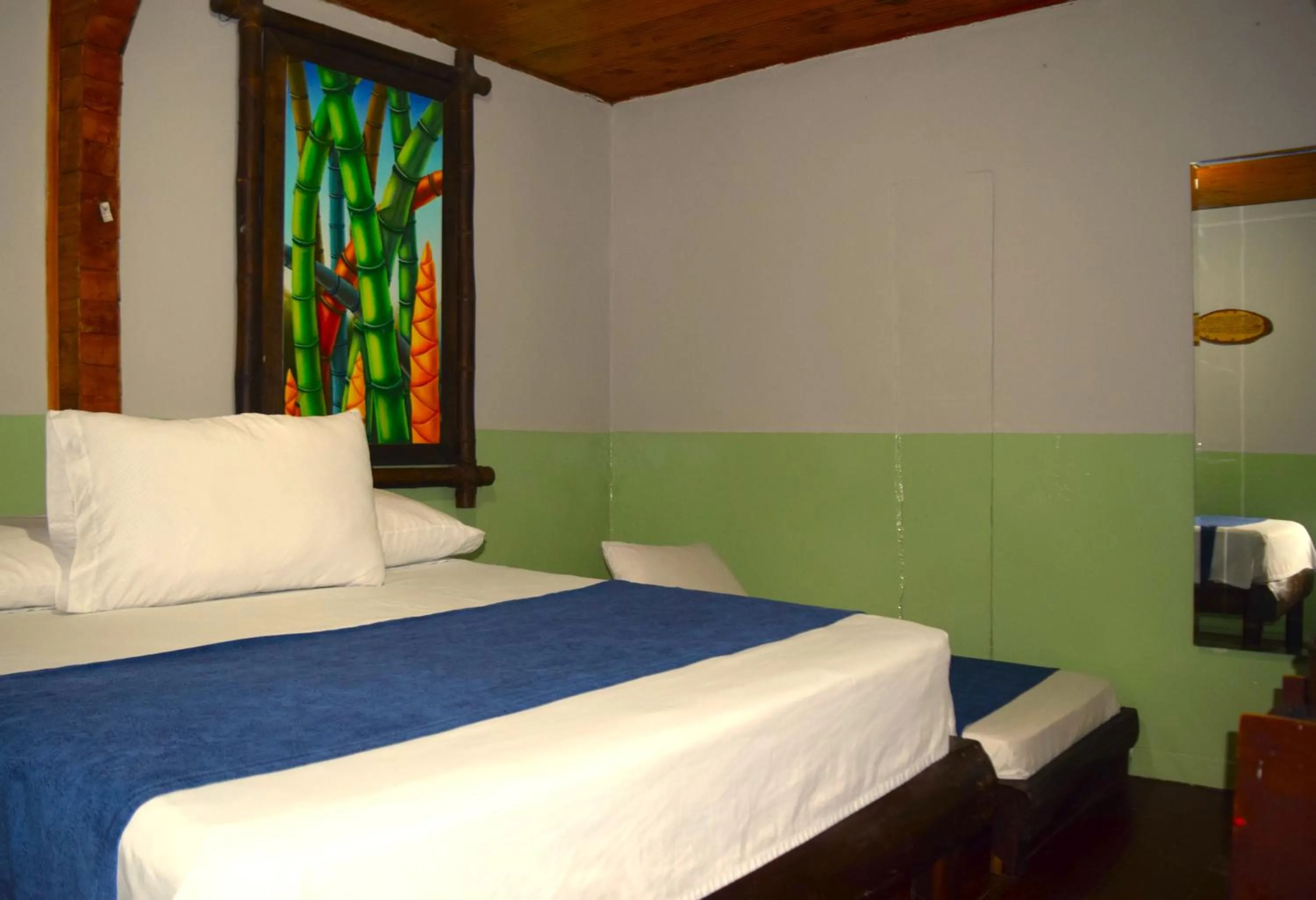 Bed in FILANDIA HOTEL