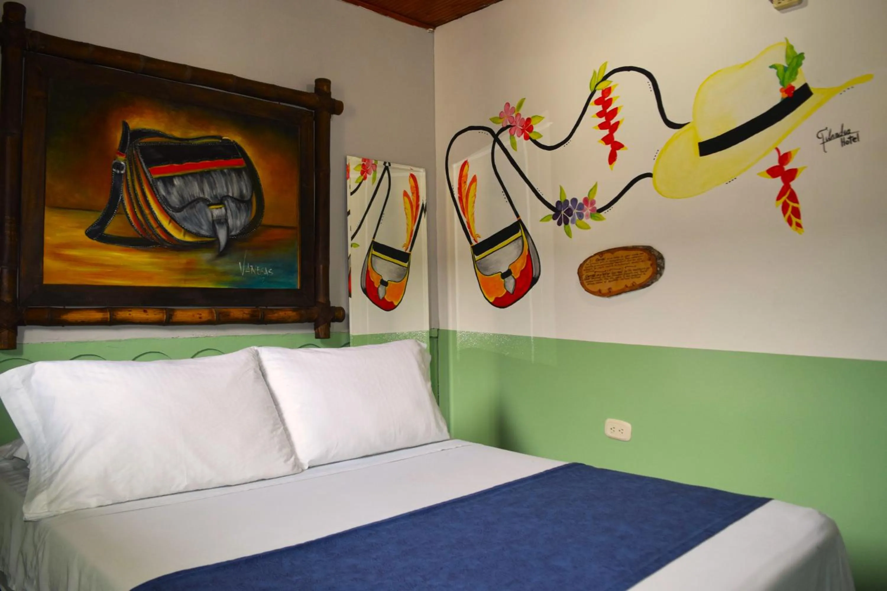 Bed in FILANDIA HOTEL