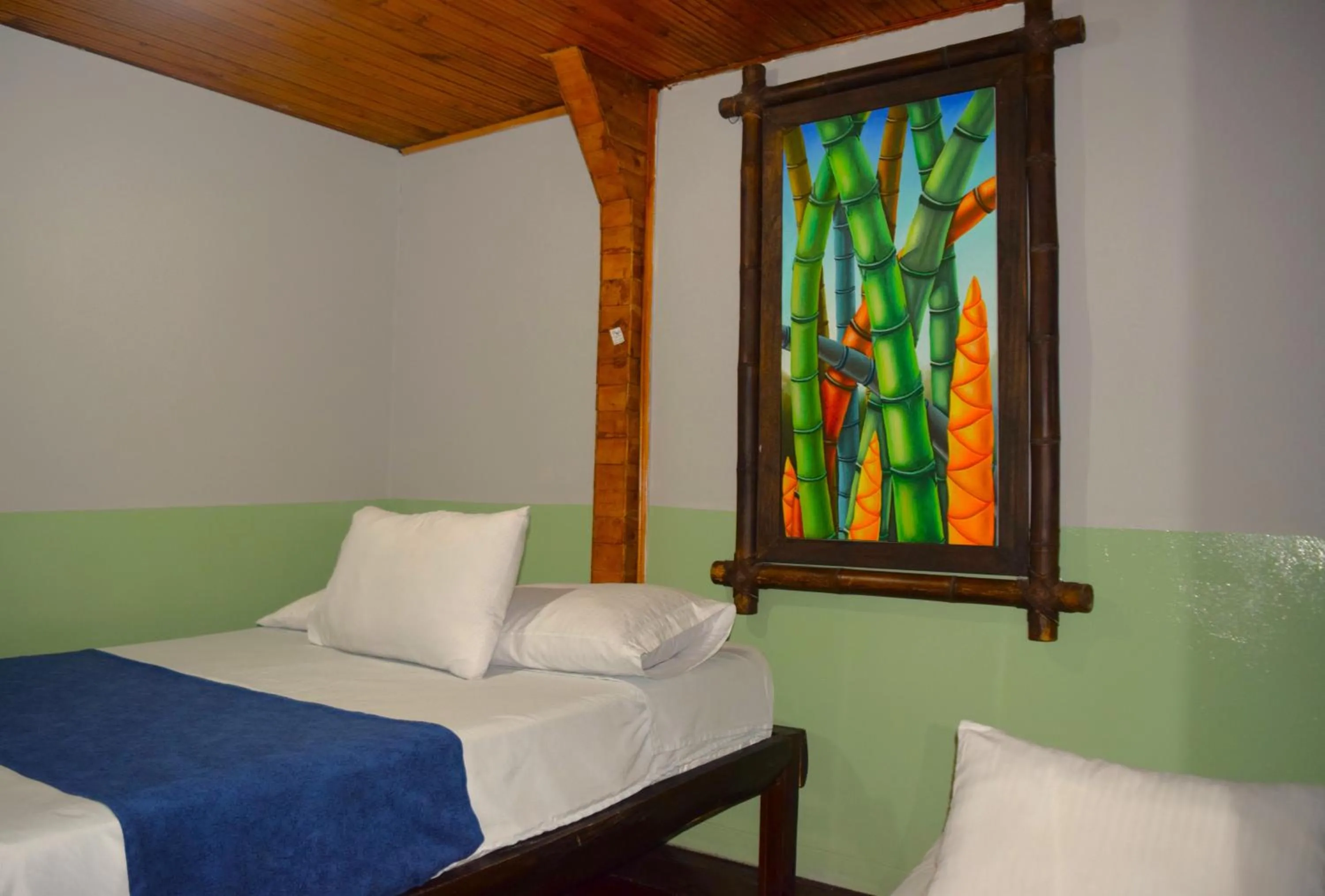 Bed in FILANDIA HOTEL