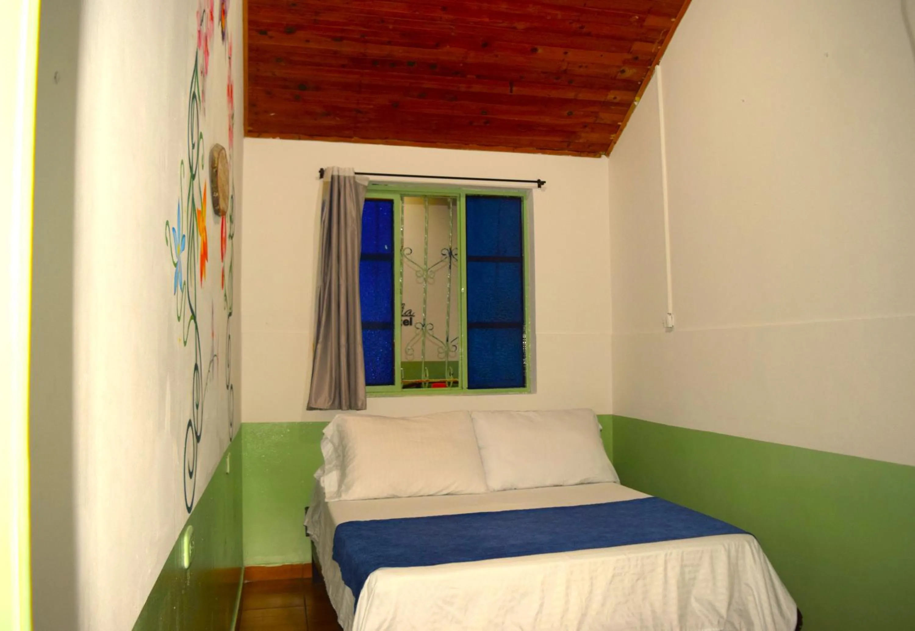 Bed in FILANDIA HOTEL