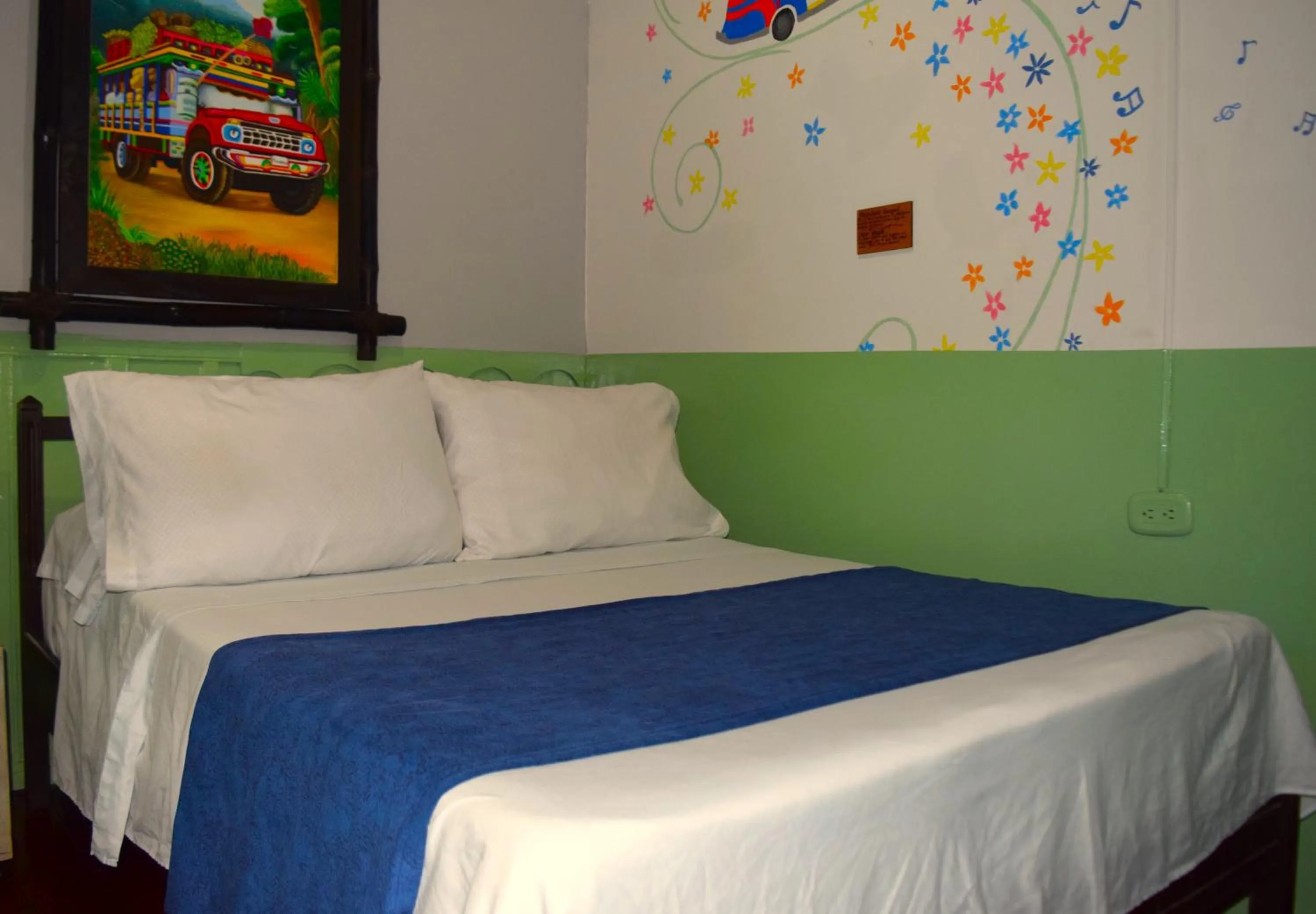 Bed in FILANDIA HOTEL