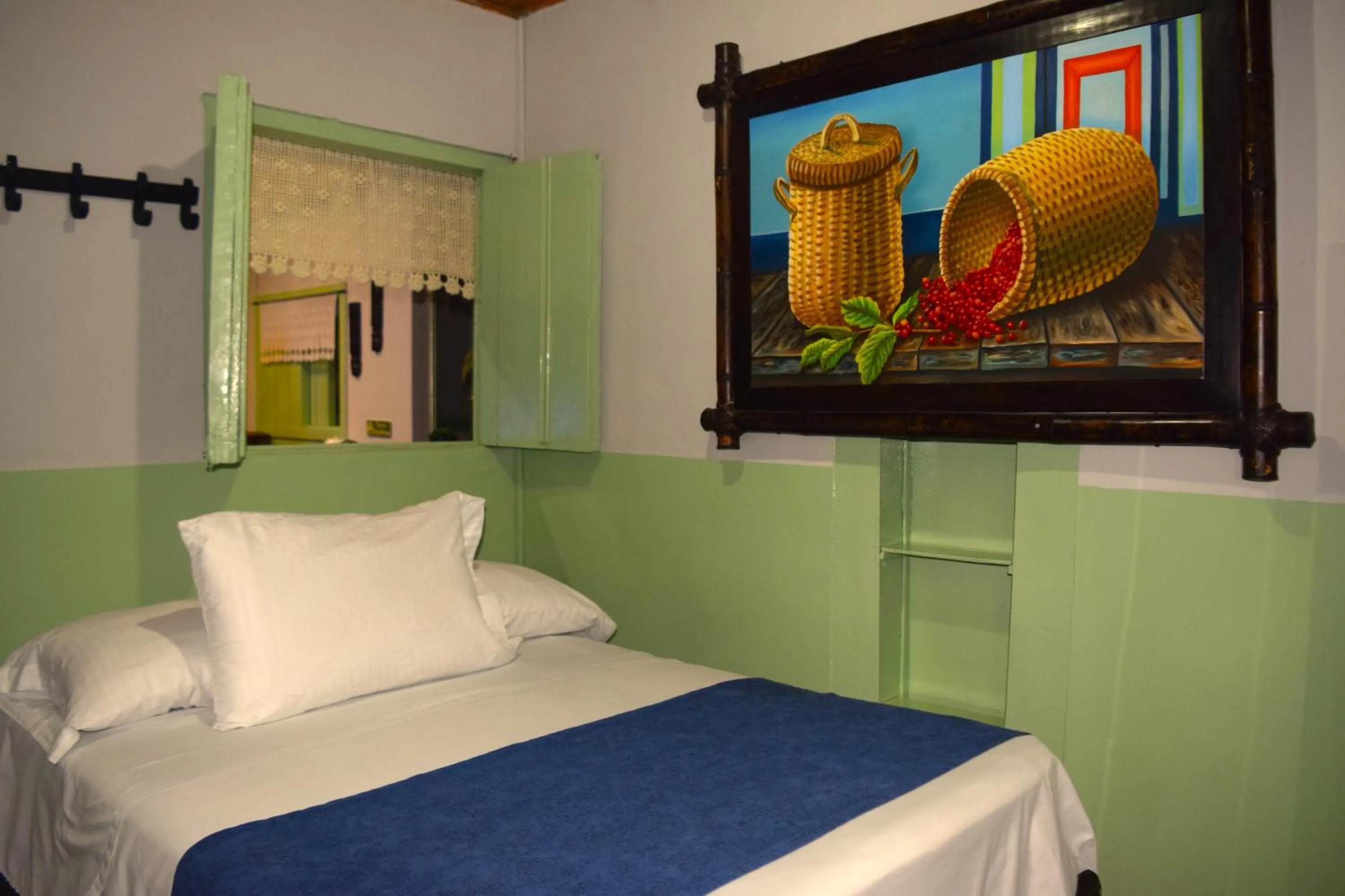 Bed in FILANDIA HOTEL
