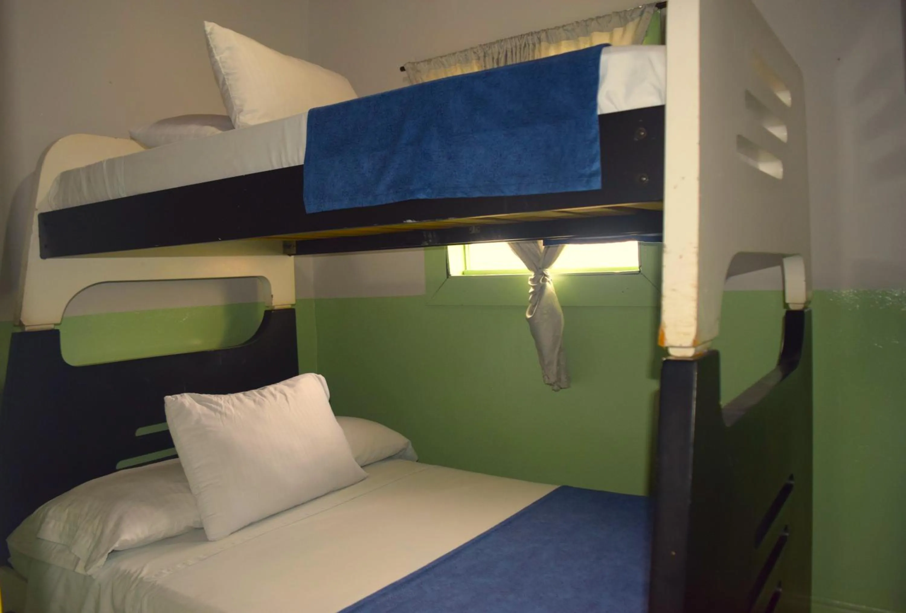 Bed in FILANDIA HOTEL