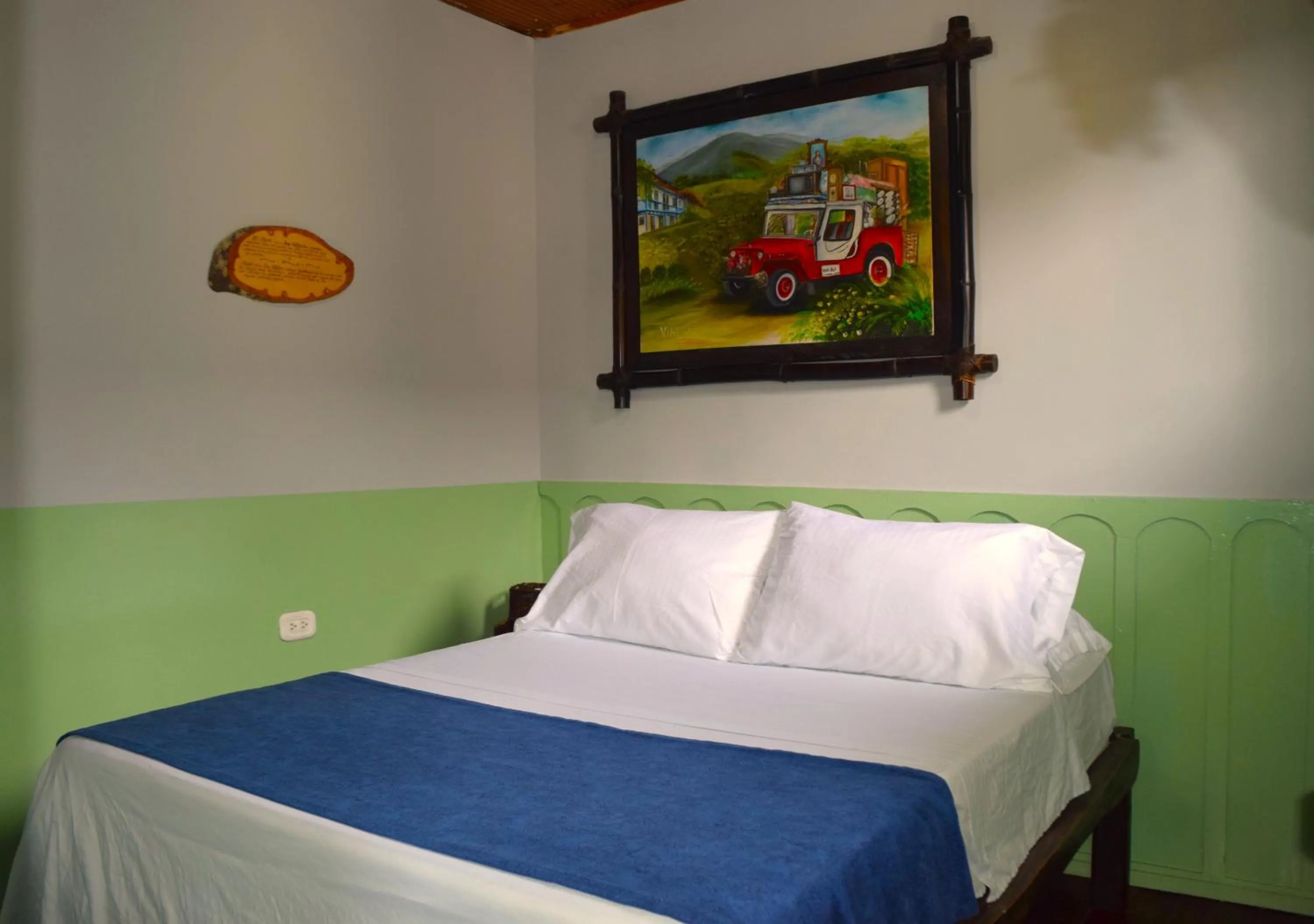 Bed in FILANDIA HOTEL