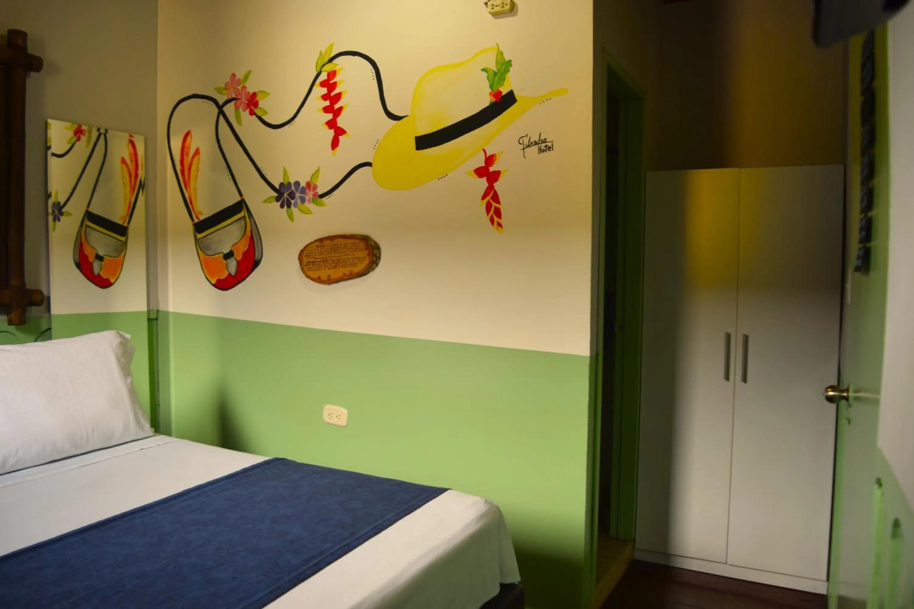 Bed in FILANDIA HOTEL