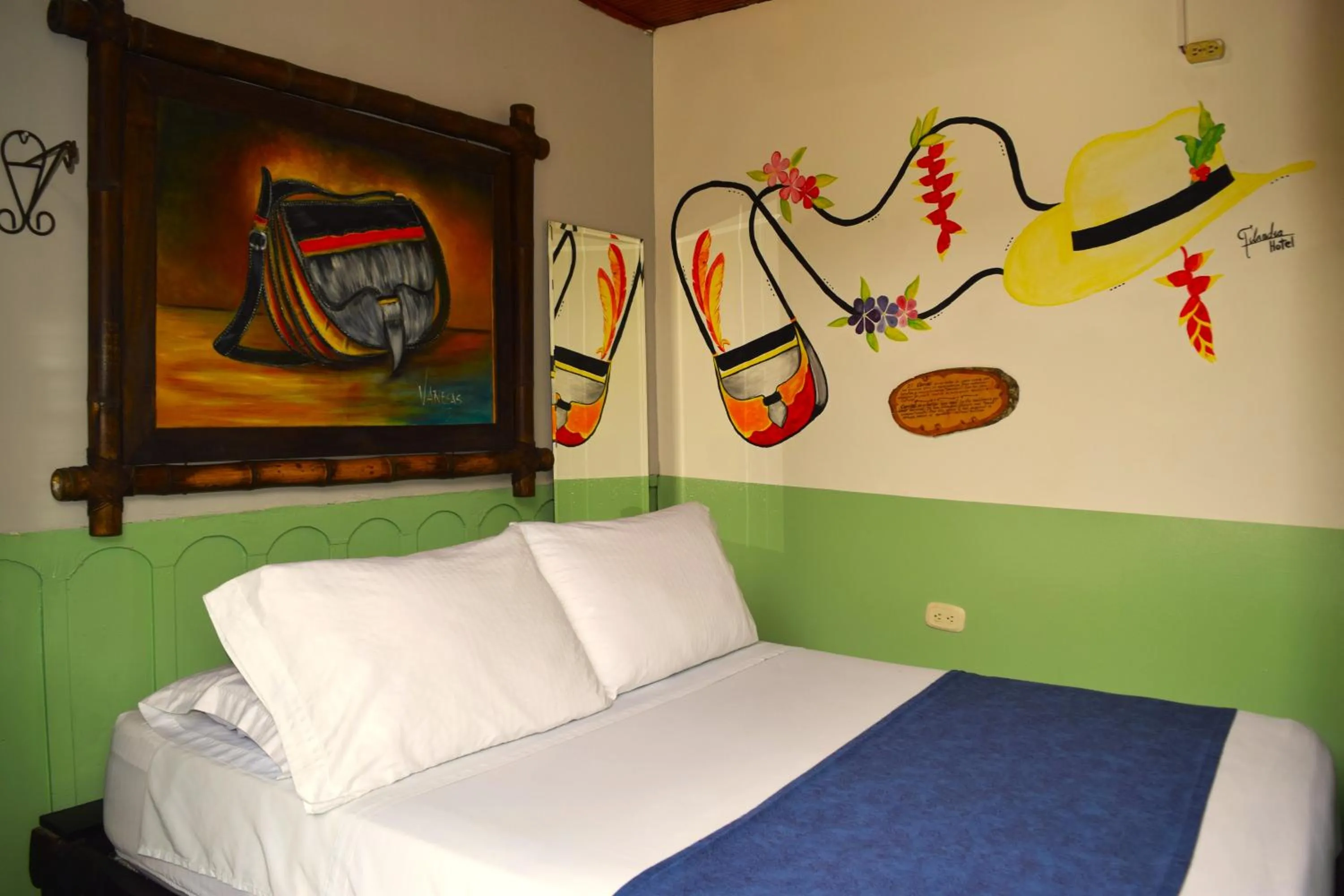 Bed in FILANDIA HOTEL