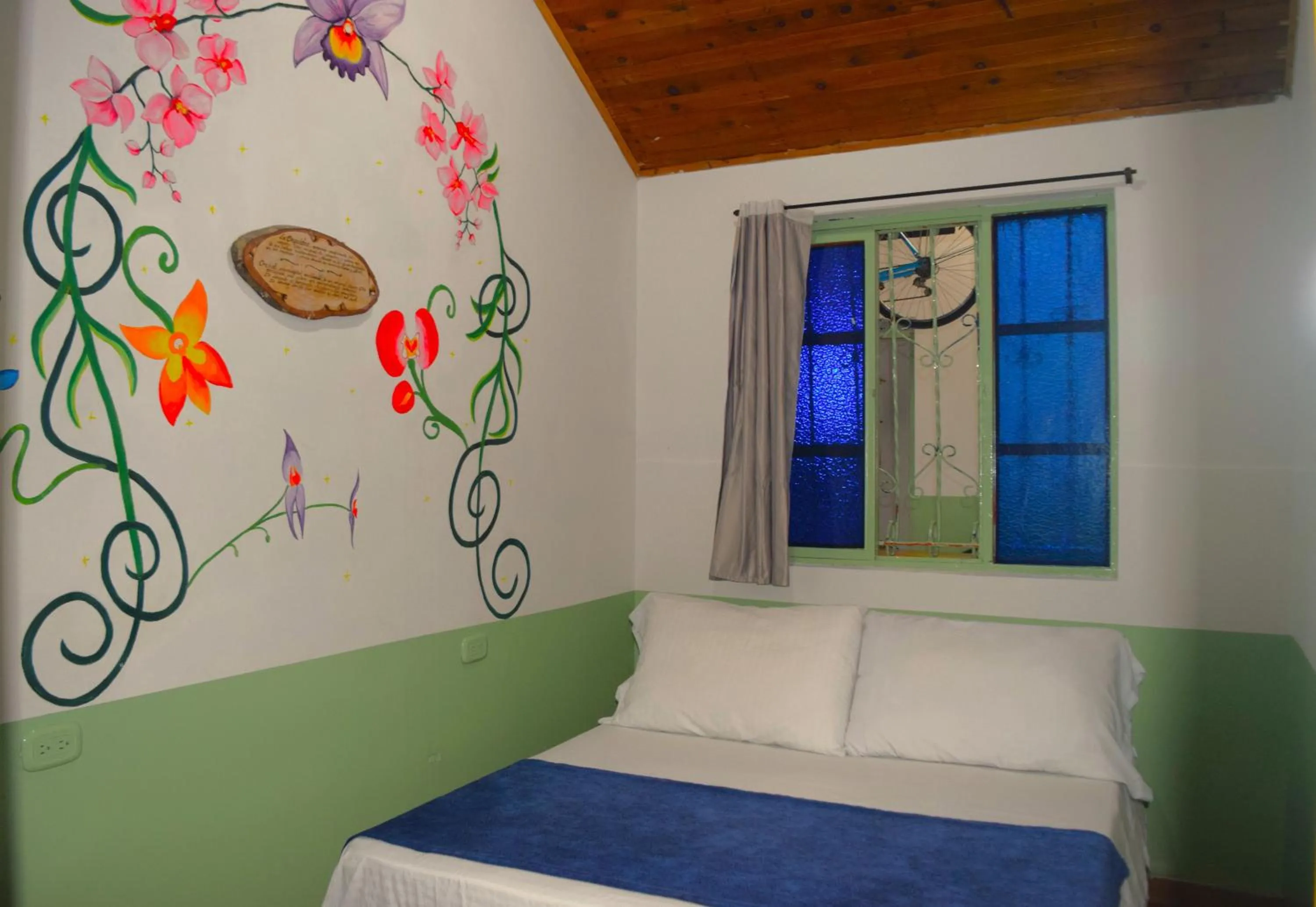 Bed in FILANDIA HOTEL