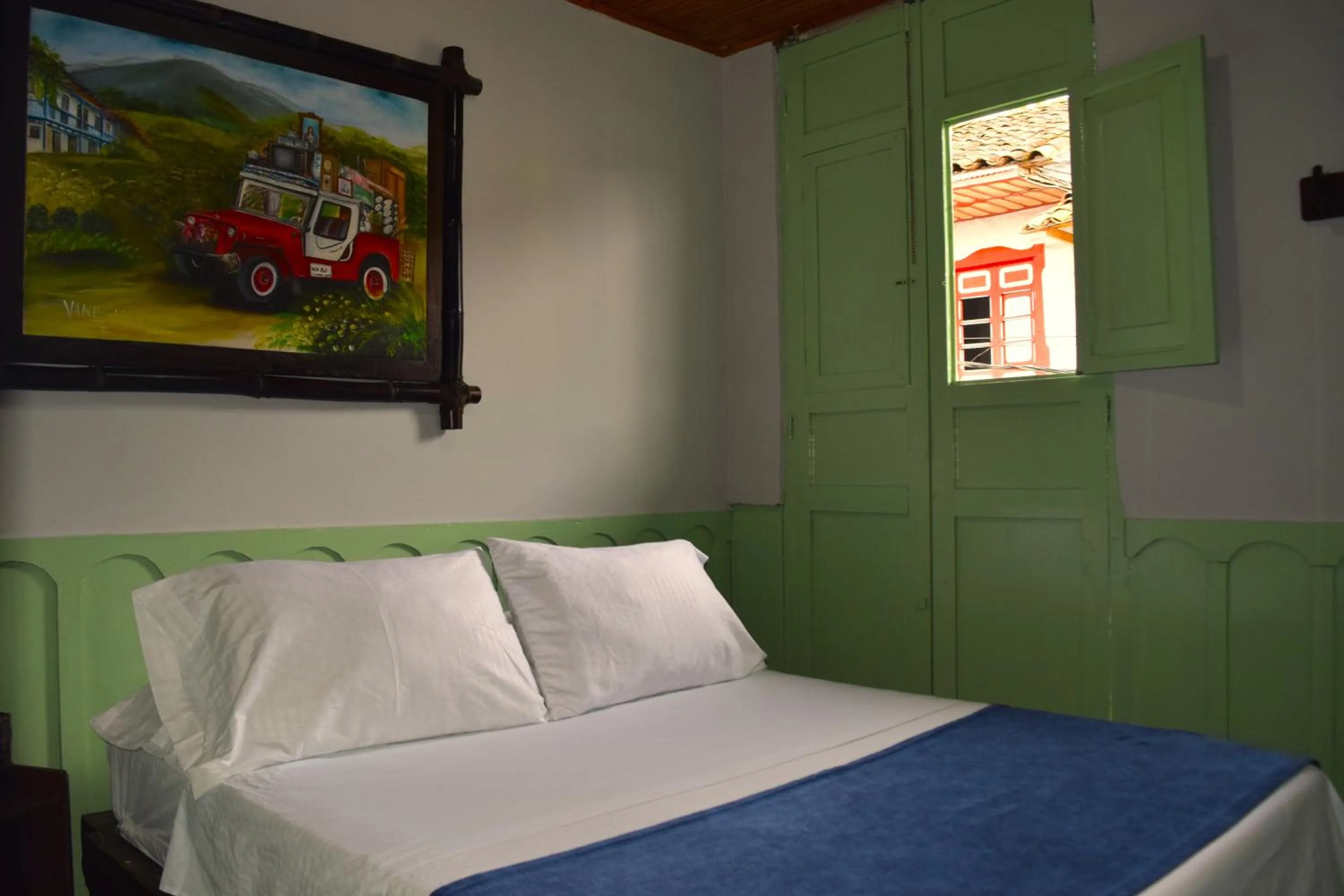 Bed in FILANDIA HOTEL