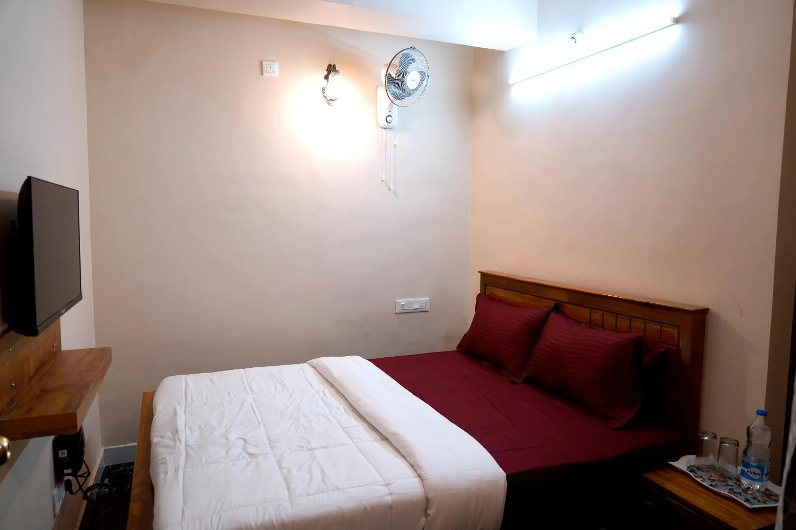 Bed in HILL PALACE RESIDENCY COORG