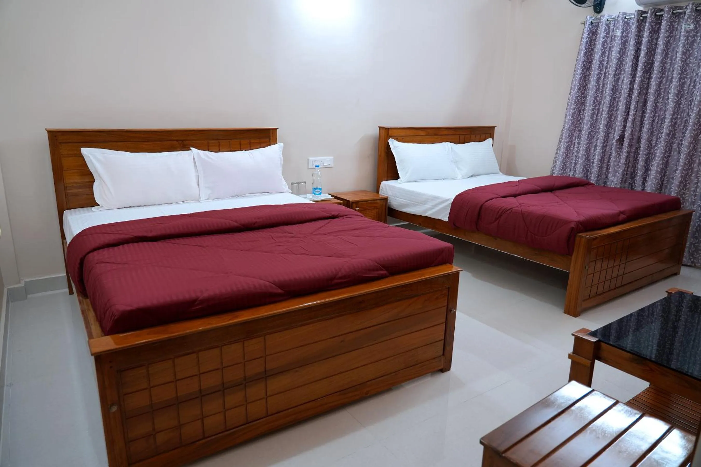 Bed in HILL PALACE RESIDENCY COORG