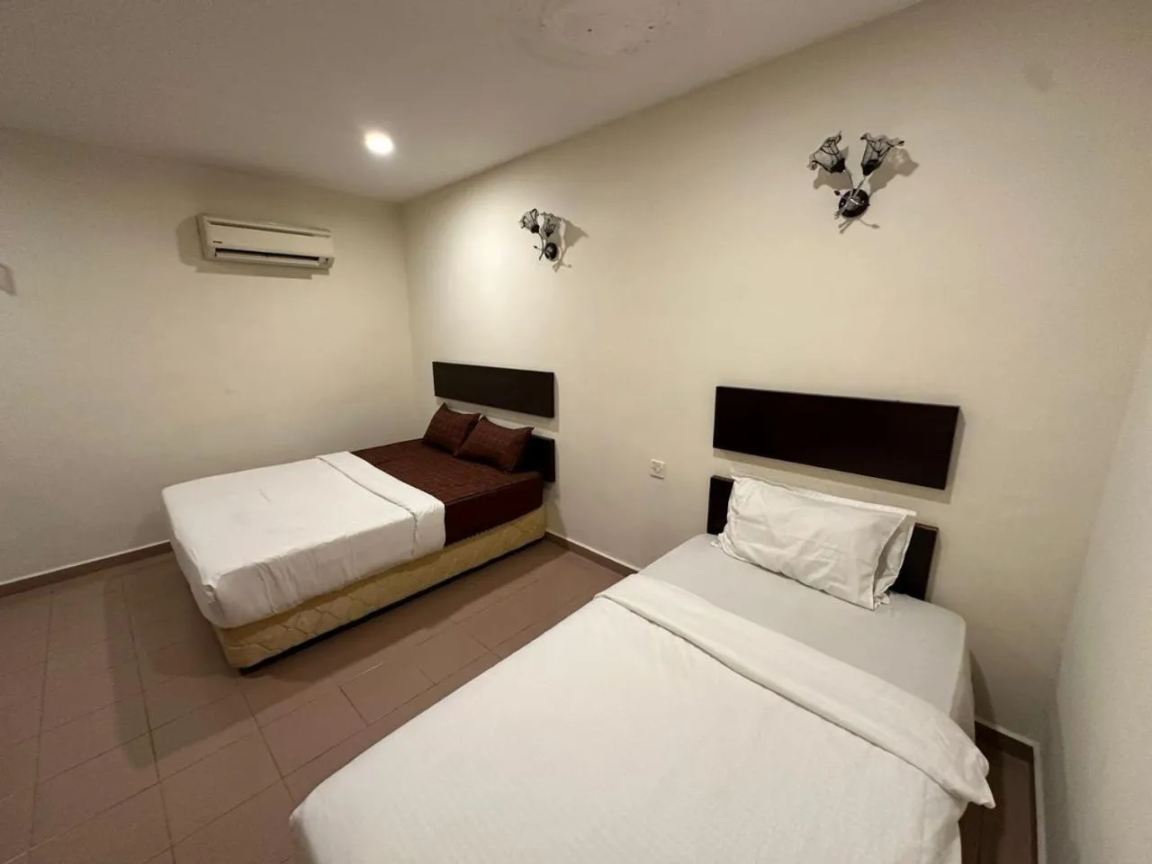 Bed in Ezzy In Hotel