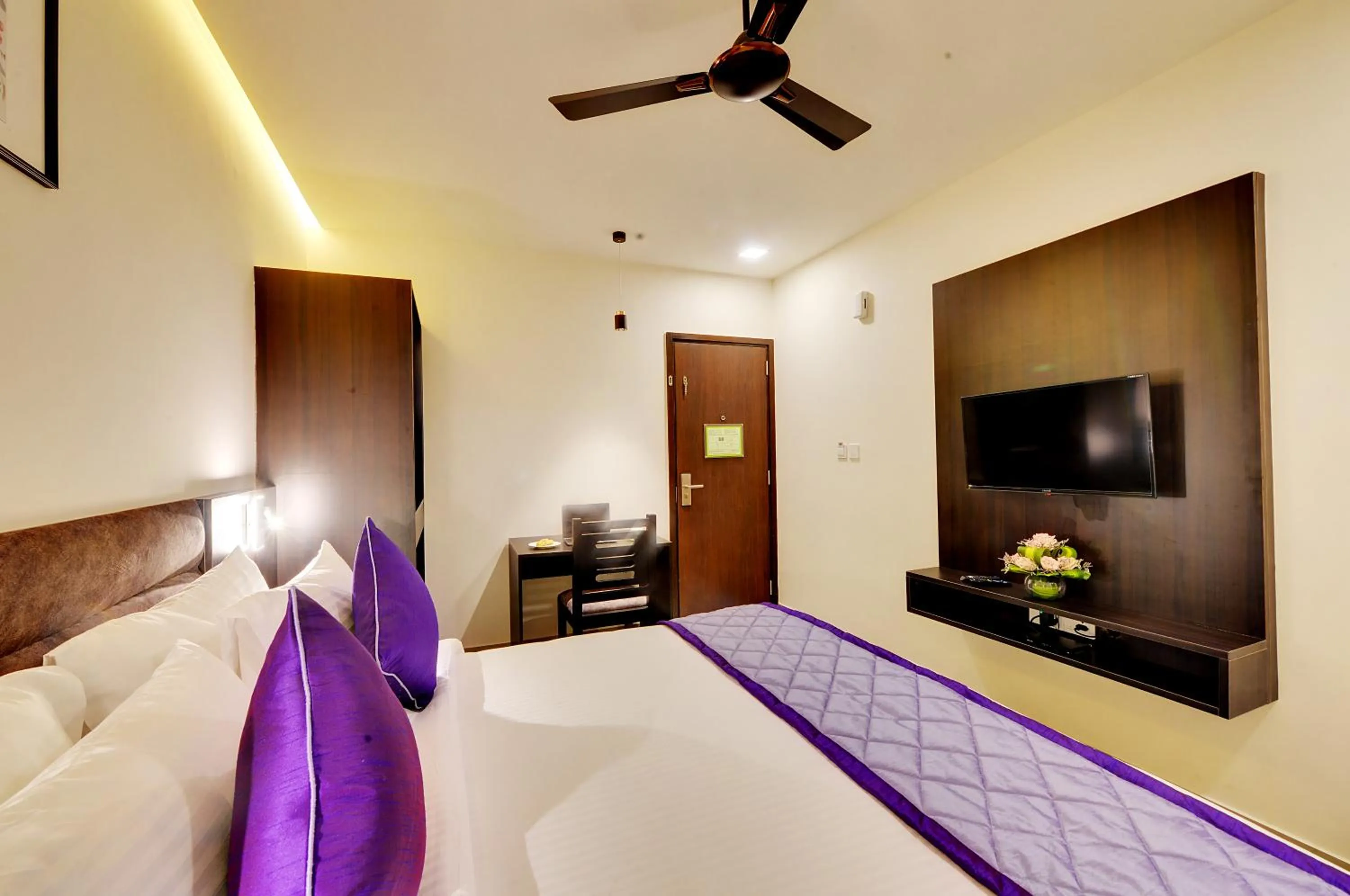 Bed in The Lavender Hotel