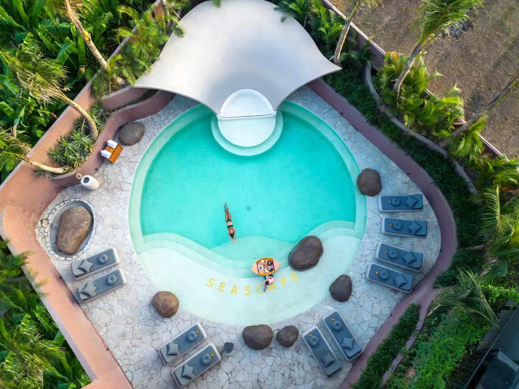 Swimming pool in Seascape Resort & Spa Sanur by Ini Vie Hospitality Swimming pool in Seascape Resort & Spa Sanur by Ini Vie Hospitality