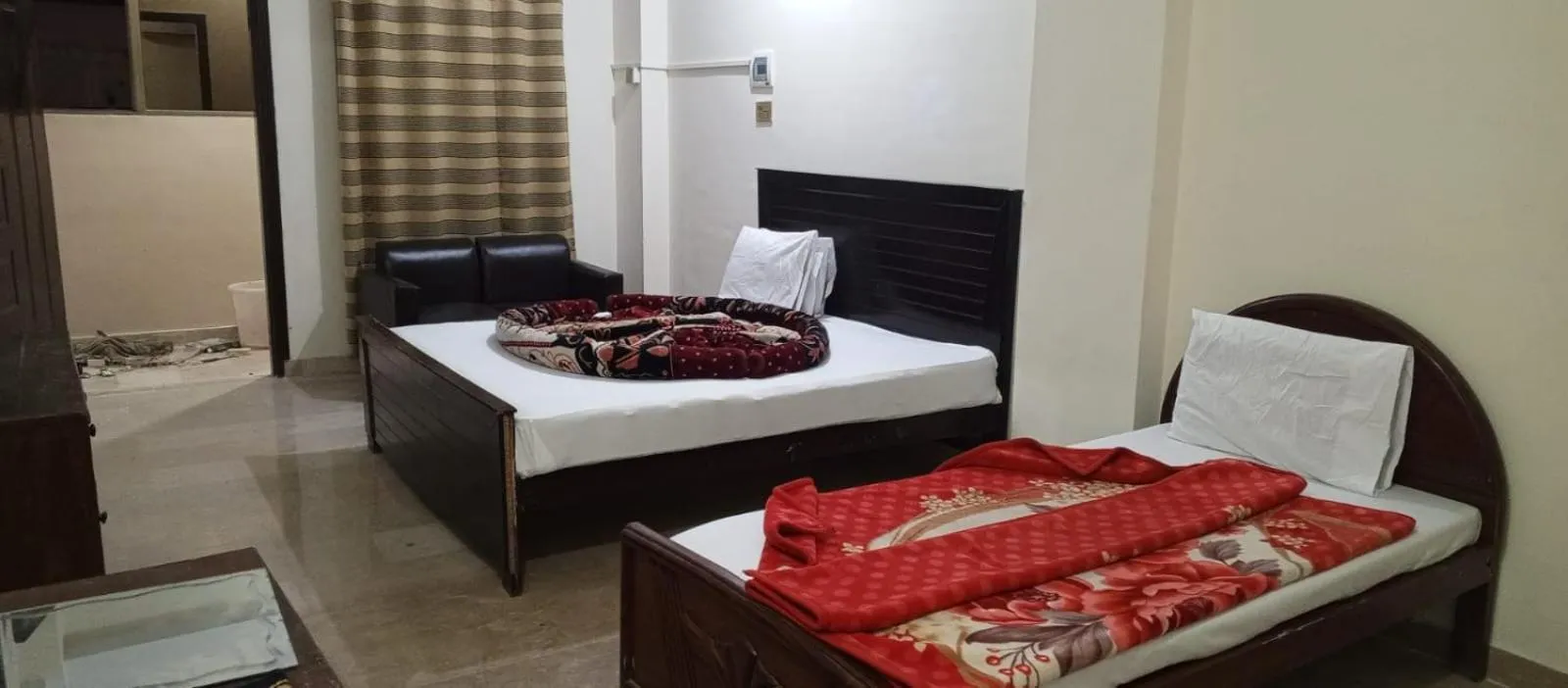 Bed in Hotel Abbasi Palace
