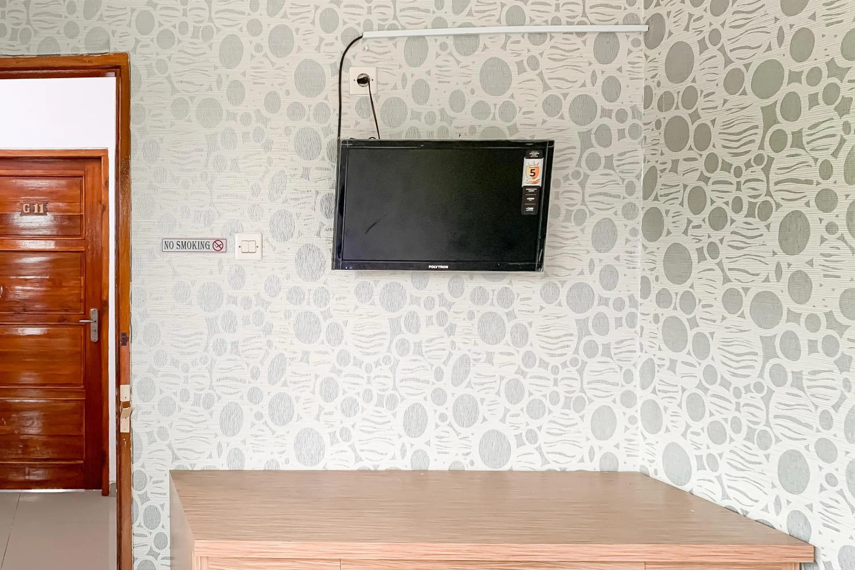 TV and multimedia in Penginapan Losmen Ayu Pamanukan RedPartner