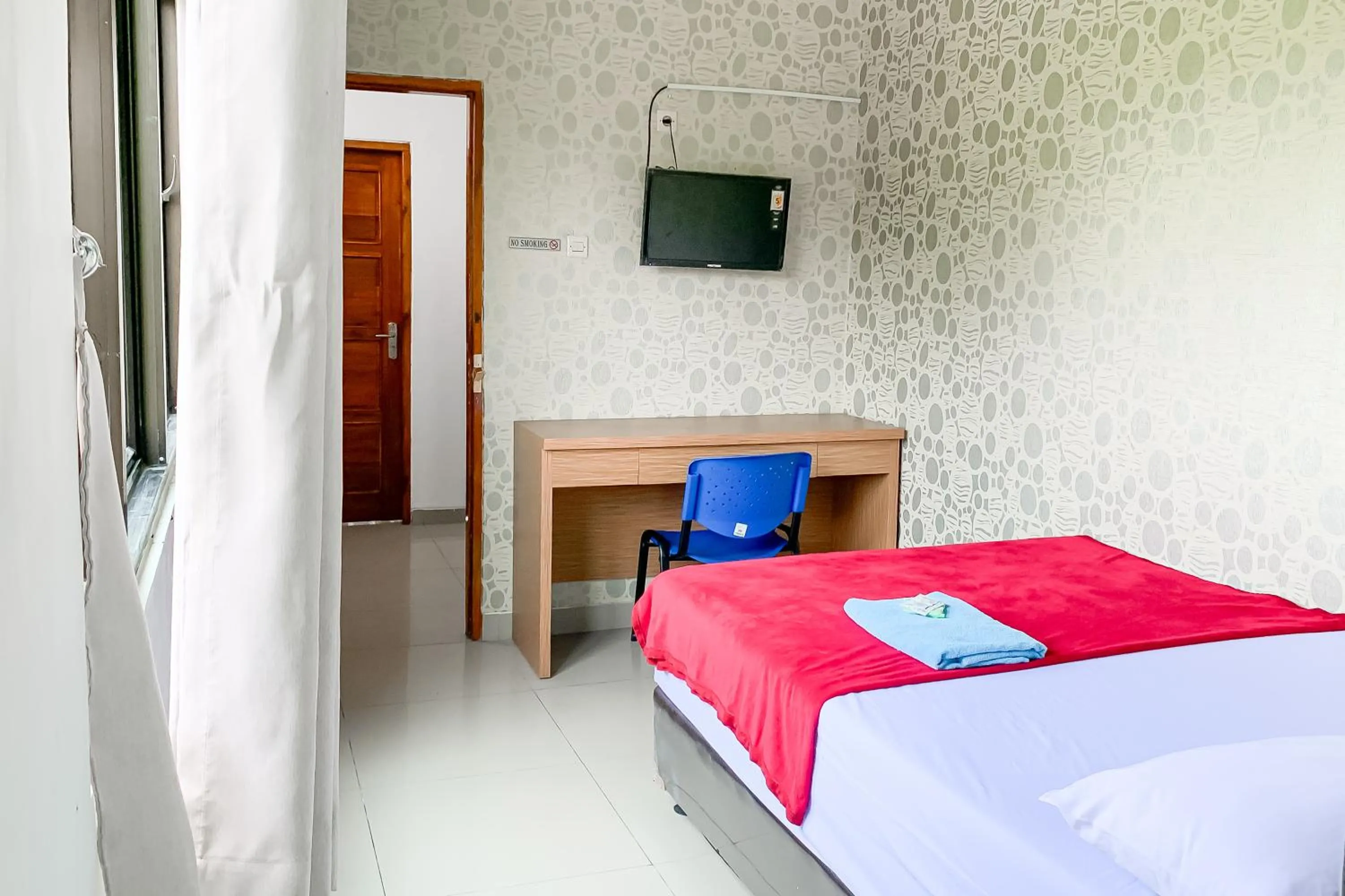 Bedroom, Bed in Penginapan Losmen Ayu Pamanukan RedPartner