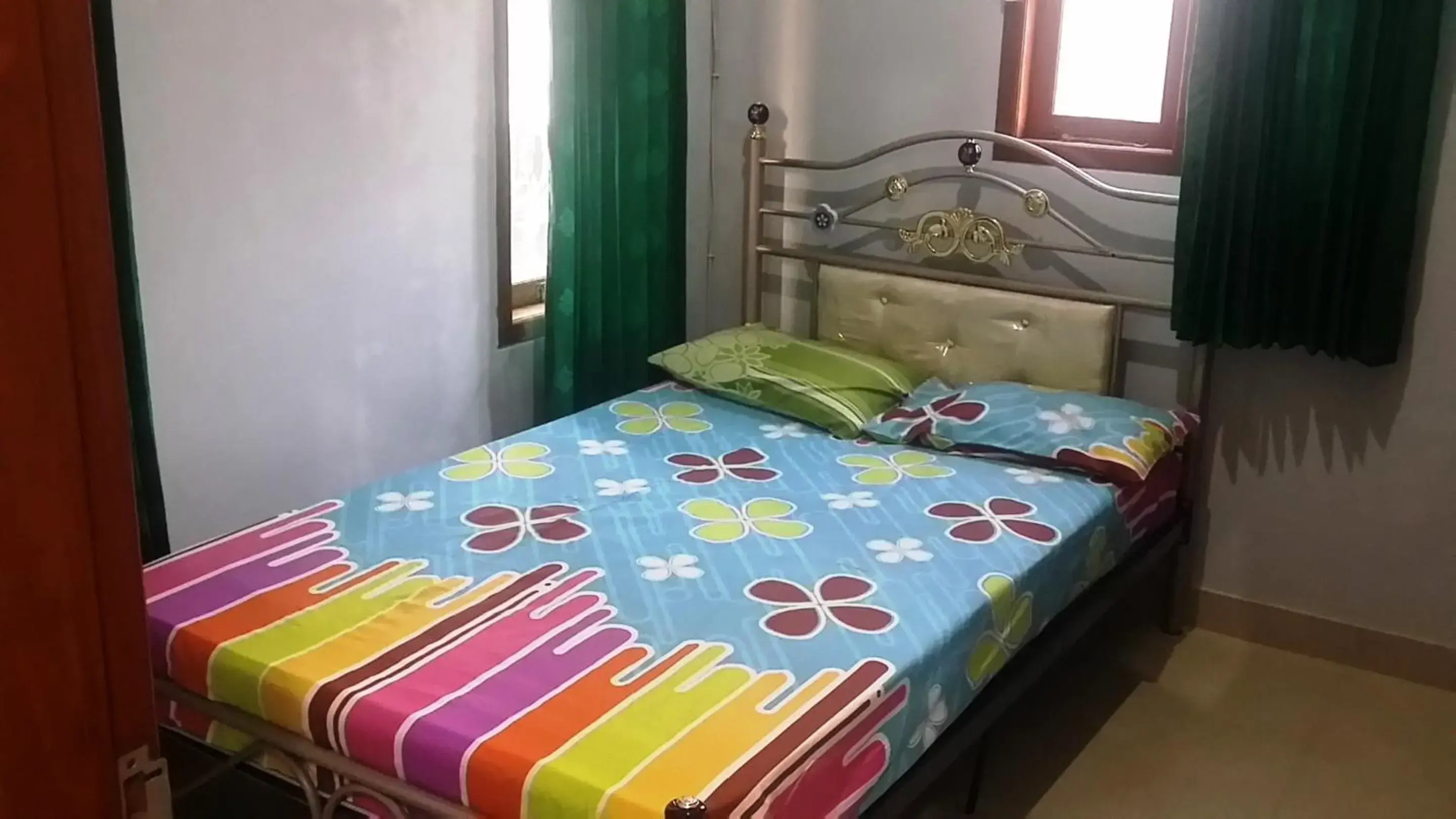 Bedroom, Bed in Hotel O Guest House Bu Iin Syariah Bedroom, Bed in Hotel O Guest House Bu Iin Syariah